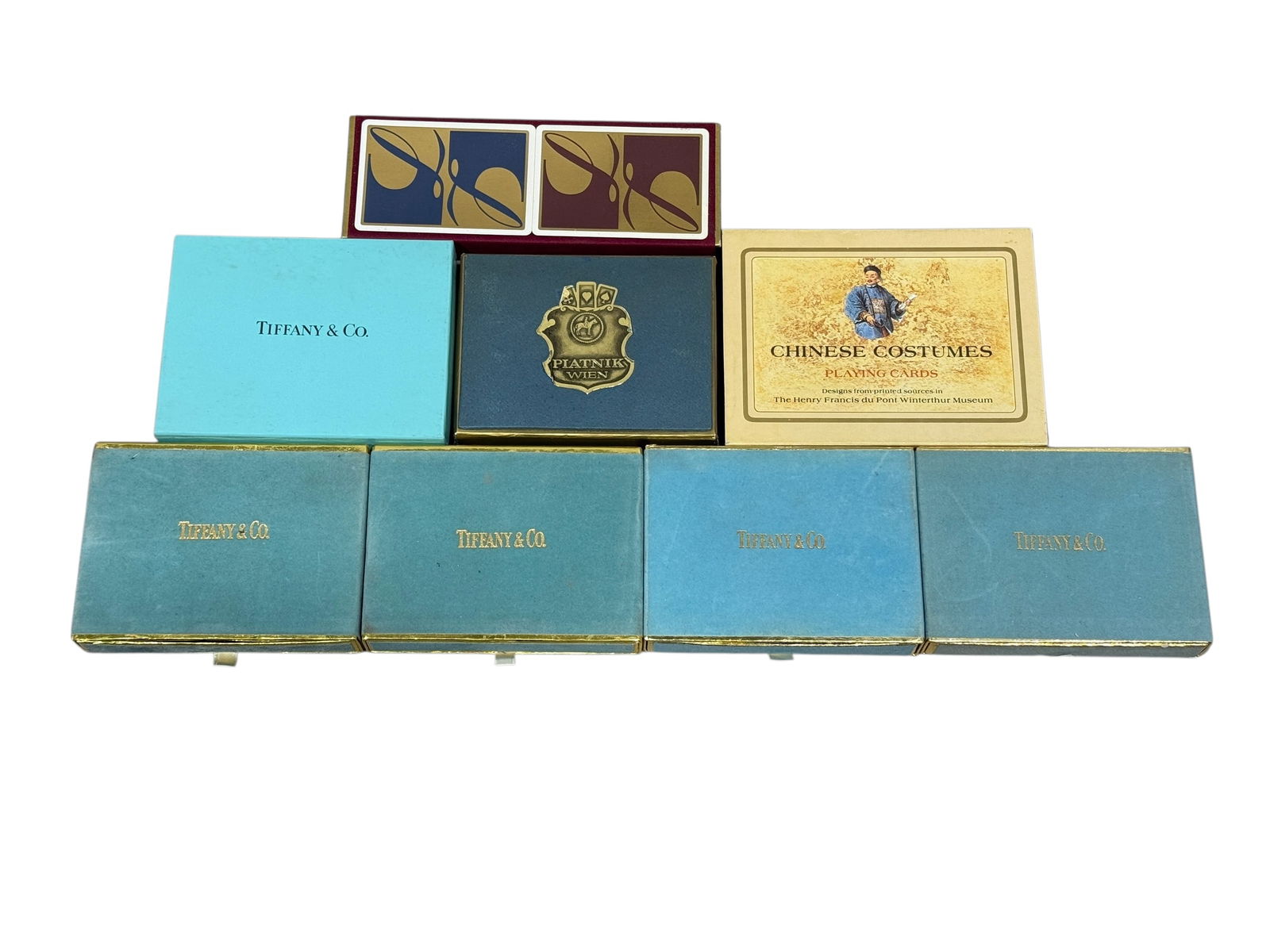 Group of 8 Sets of Playing Cards: Group of 8 Sets of Playing Cards. 5 Sets of Tiffany & Co playing cards, Loewe playing card set, Piatnik Wen playing card set and Winterthur Interpretation playing card set. Most packs of cards are unu