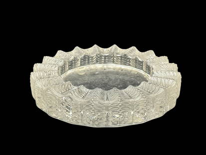 Signed Lalique France Crystal "Jamaique" Ashtray: Signed Lalique France Crystal "Jamaique" Ashtray. Signed Lalique France on the underside (hard to see). Measures 1" H x 5.5" W x 5.5" D. Has scratches and has some VERY small chips around outer edge.