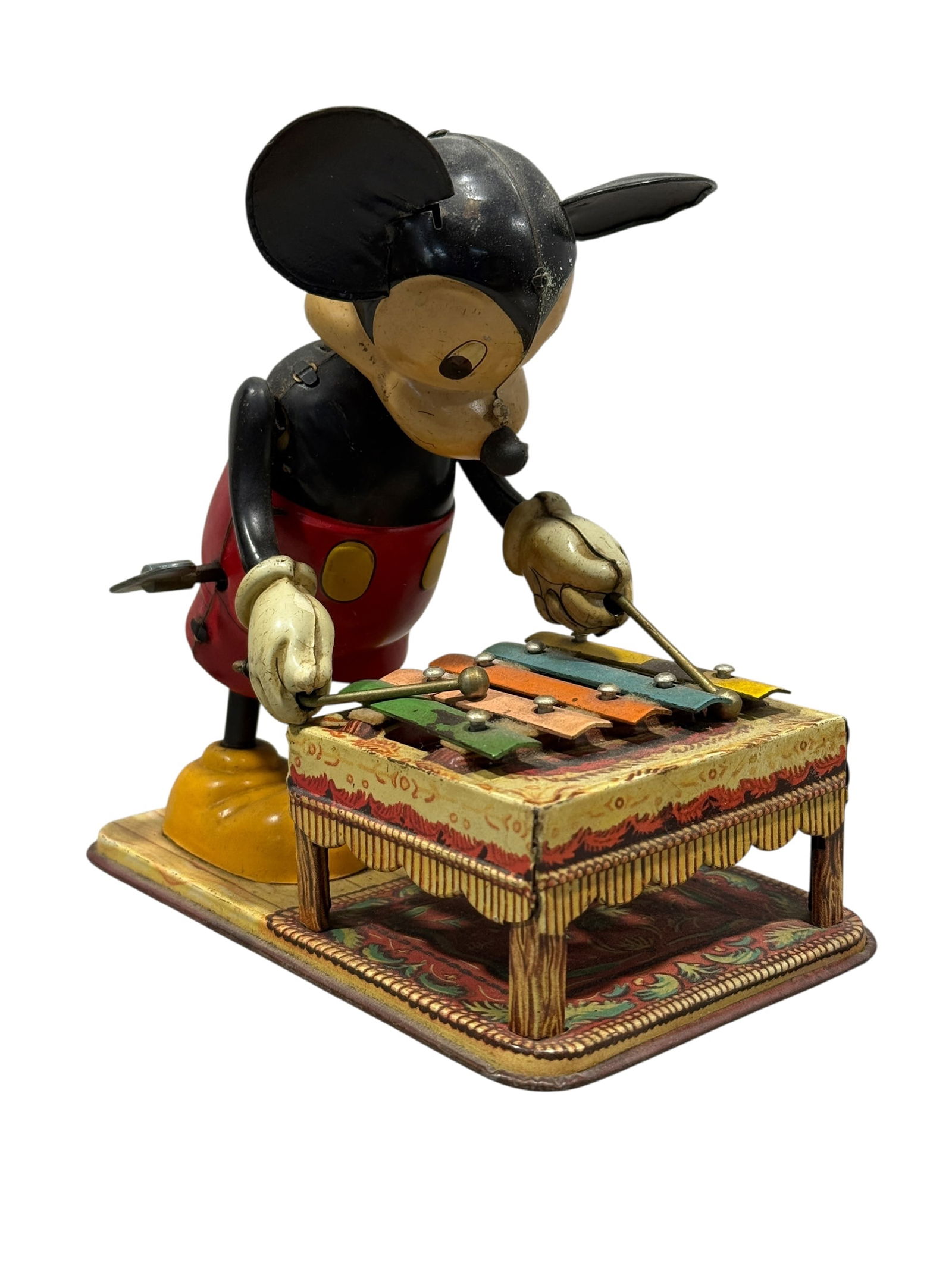 Line Mar Walt Disney Tin Wind-Up Mickey Mouse Xylophone Toy: Line Mar Walt Disney Tin Wind-Up Mickey Mouse Xylophone Toy. Line Mar markings has been scratched off Mickey's back but marked Walt Disney Productions. Measures 5.75" H x 3.5" W x 5.75" D. Wind-up is