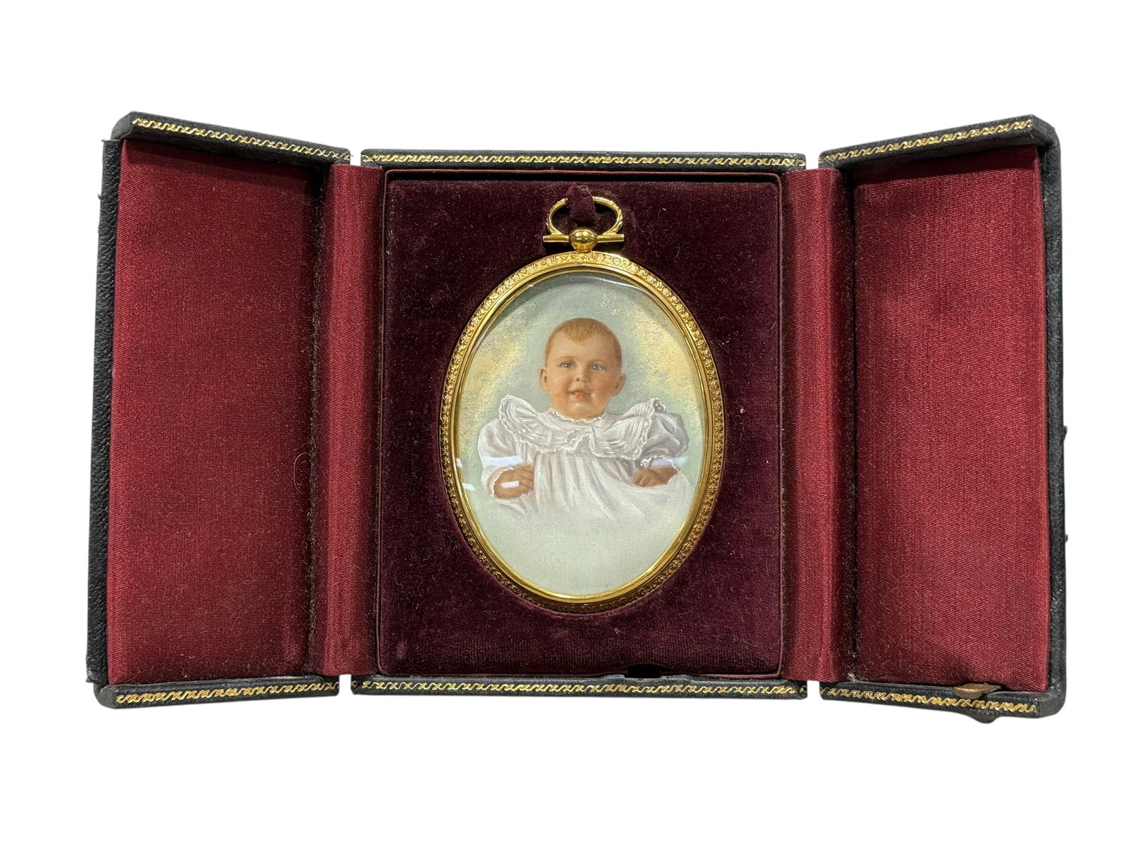 Antique English Hand Painted Child Portrait in Leather Triptych Case: Antique English Hand Painted Child Portrait in Leather Triptych Case. Portrait frame measures 4.25" x 3". Case measures 5.5" H x 4.5" W x 1.5" D. Case in rough condition.
