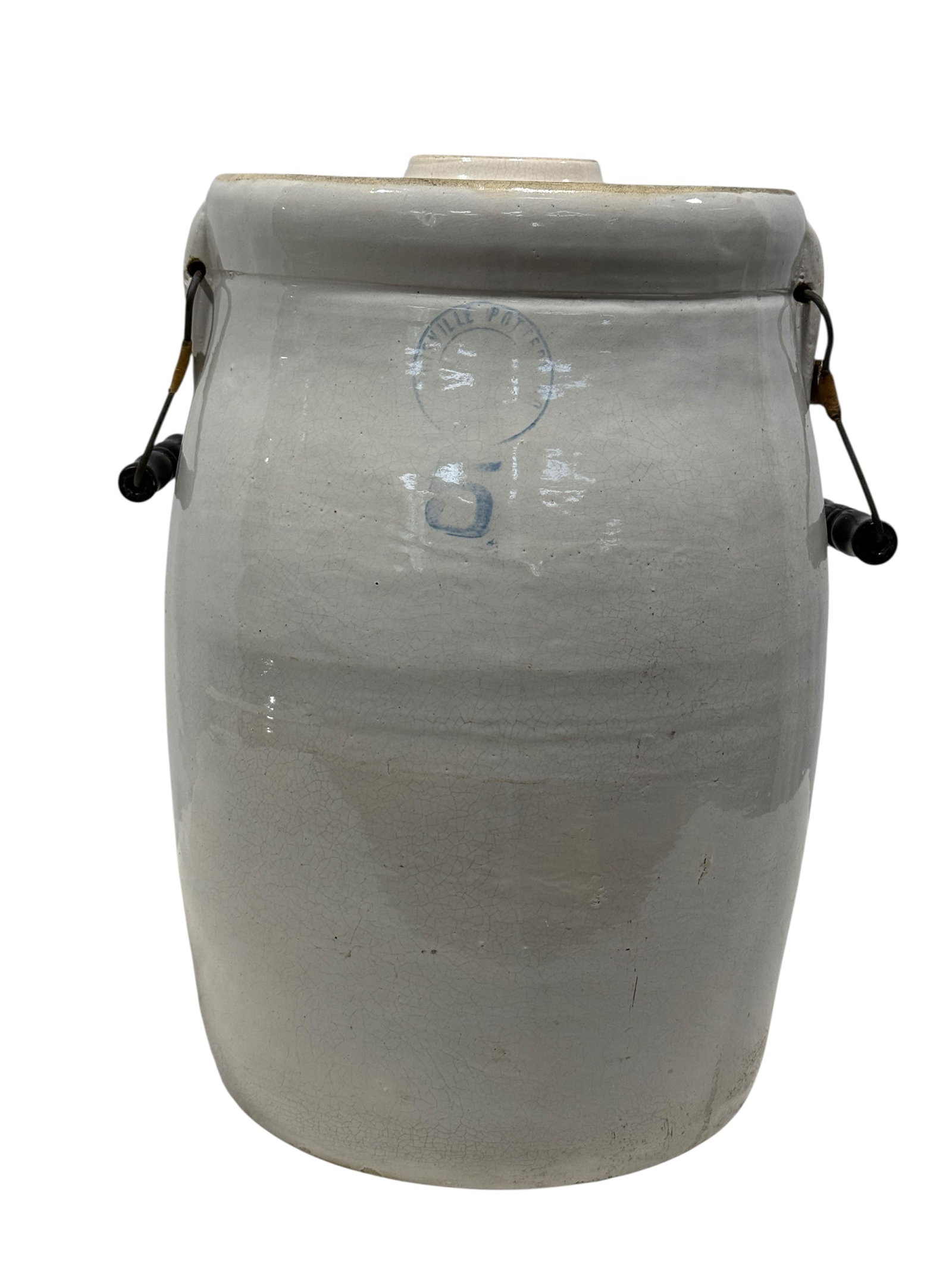 5 Gal. Louisville Pottery Co. Churn: 5 Gal. Louisville Pottery Co. Churn. Marked on the front and lid is marked 5. Has double metal handles. Measures 16.75" H x 11" W x 11" D. Missing dasher. Has some chips on the underside.