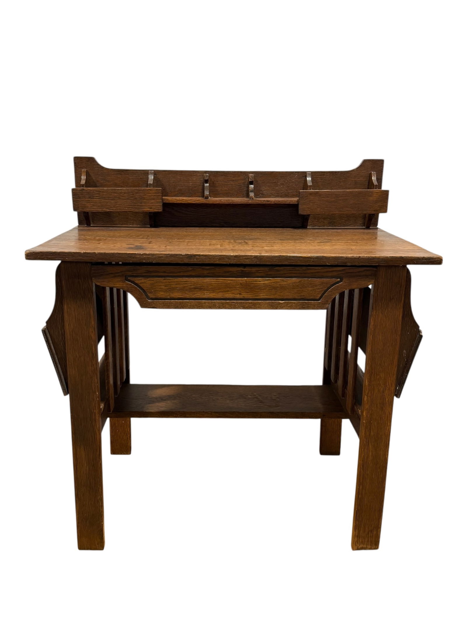 Antique Mission Oak Arts & Crafts Desk in The Style of Stickley: Antique Mission Oak Arts & Crafts Desk in The Style of Stickley. Measures 36.25" H x 34" W x 20" D. Has scuffs and scratches. Bottom of drawer has been redone.