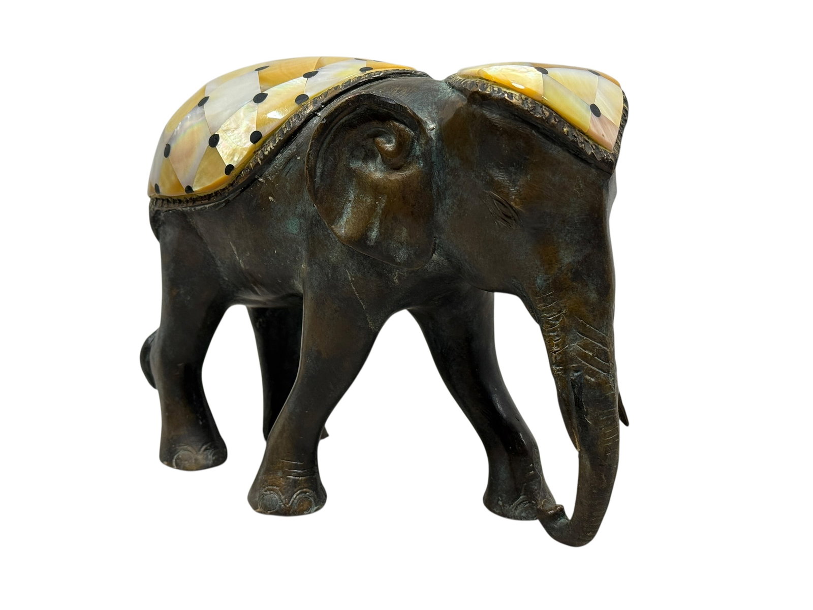 Maitland Smith Bronze & Inlaid Mother of Pearl Elephant: Maitland Smith Bronze & Inlaid Mother of Pearl Elephant. Maitland Smith label on the underside. Measures 7.25" H x 9.25" W x 4.5" D. Has some scratches and showing some patina.