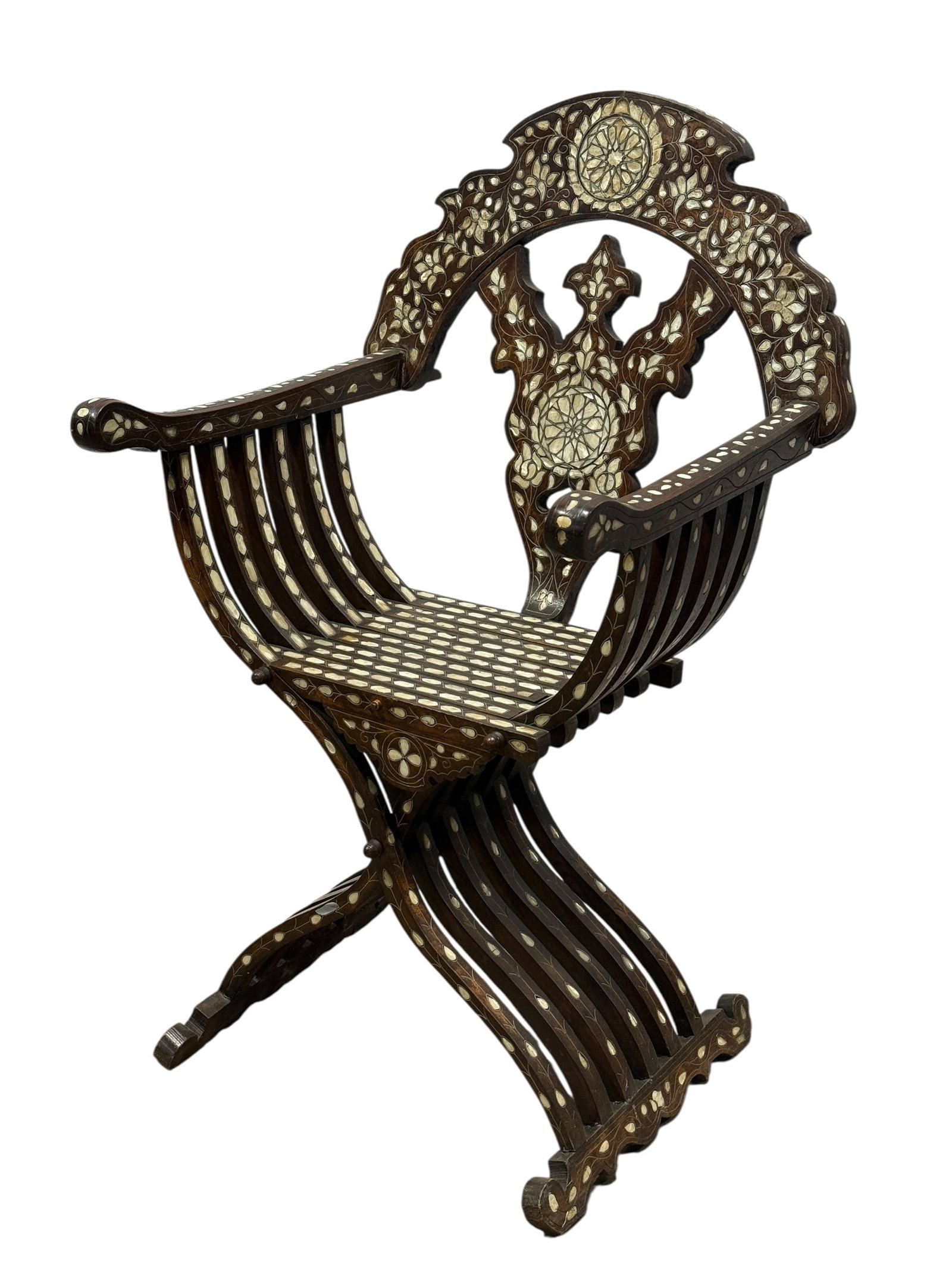 19th C. Syrian Savonarola Mother of Pearl Inlay Chair: 19th C. Syrian Savonarola Mother of Pearl Inlay Chair. Measures 41.5" H x 25.25" W x 22.5" D. Seat height measures 20" H. Condition reflects its age, missing a mother of pearl piece on the leg.