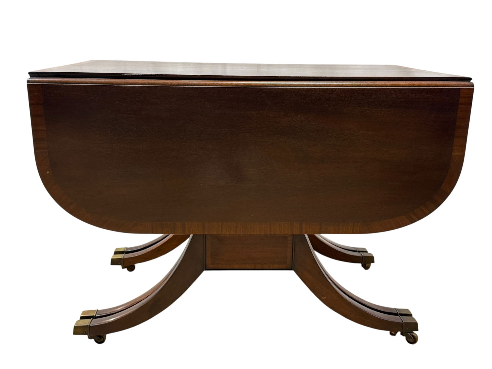 Duncan Phyfe 4 Pedestal Drop Leaf Table w/ 3 Leaves: Duncan Phyfe 4 Pedestal Drop Leaf Table w/ 3 Leaves. Band inlay on table top. Measures 29.75" H x 27" W x 42" D. Table top measures 56" W with drop leaves up. 3 extra leaves measure 12" W. Has scuffs,