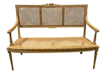 Late 19th C. French Carved Wood & Caned Settee: Late 19th C. French Carved Wood & Caned Settee. Measures 38.75" H x 53.25" W x 21.25" D. Seat height measures 16" H. Has some damage to cane on seat and settee back. Frame has some scuffs.