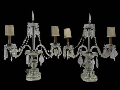 Pair of Crystal 2 Arm Candelabra Lamps: Pair of Crystal 2 Arm Candelabra Lamps. Measures 25.5" H x 20" W. Both are working. Missing some prisms.