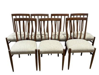 Set of 7 MCM English Dining Chairs: Set of 7 MCM English Dining Chairs. Newly upholstered. Measures 34" H x 18.5" W x 17" D. Seat height measures 18" H. Some chairs have scuffs and/or scratches.