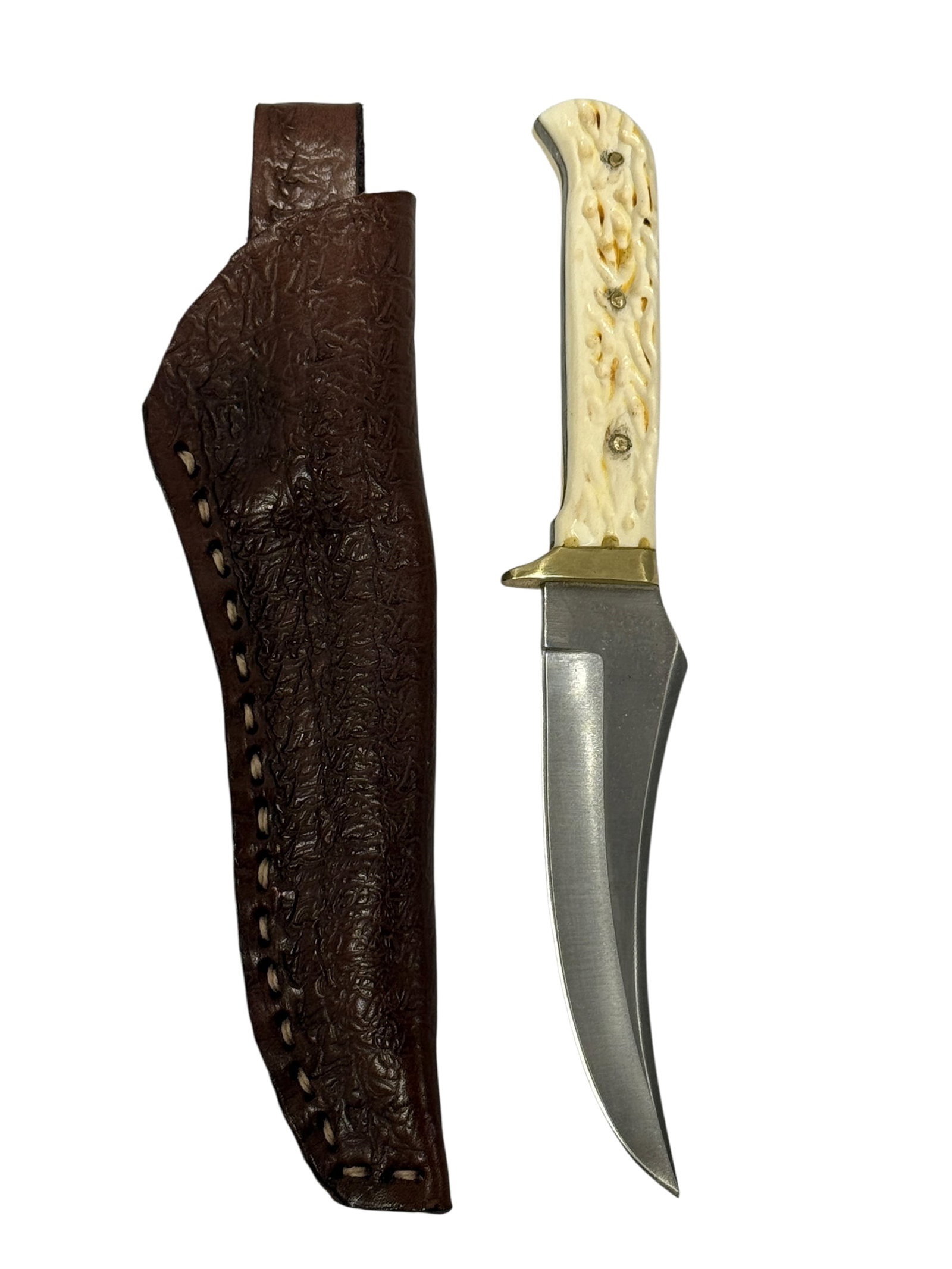 Bone Handle Knife w/ Embossed Leather Sheath: Bone Handle Knife w/ Embossed Leather Sheath. Overall measures 10" Long. Blade measures 5.25" Long.