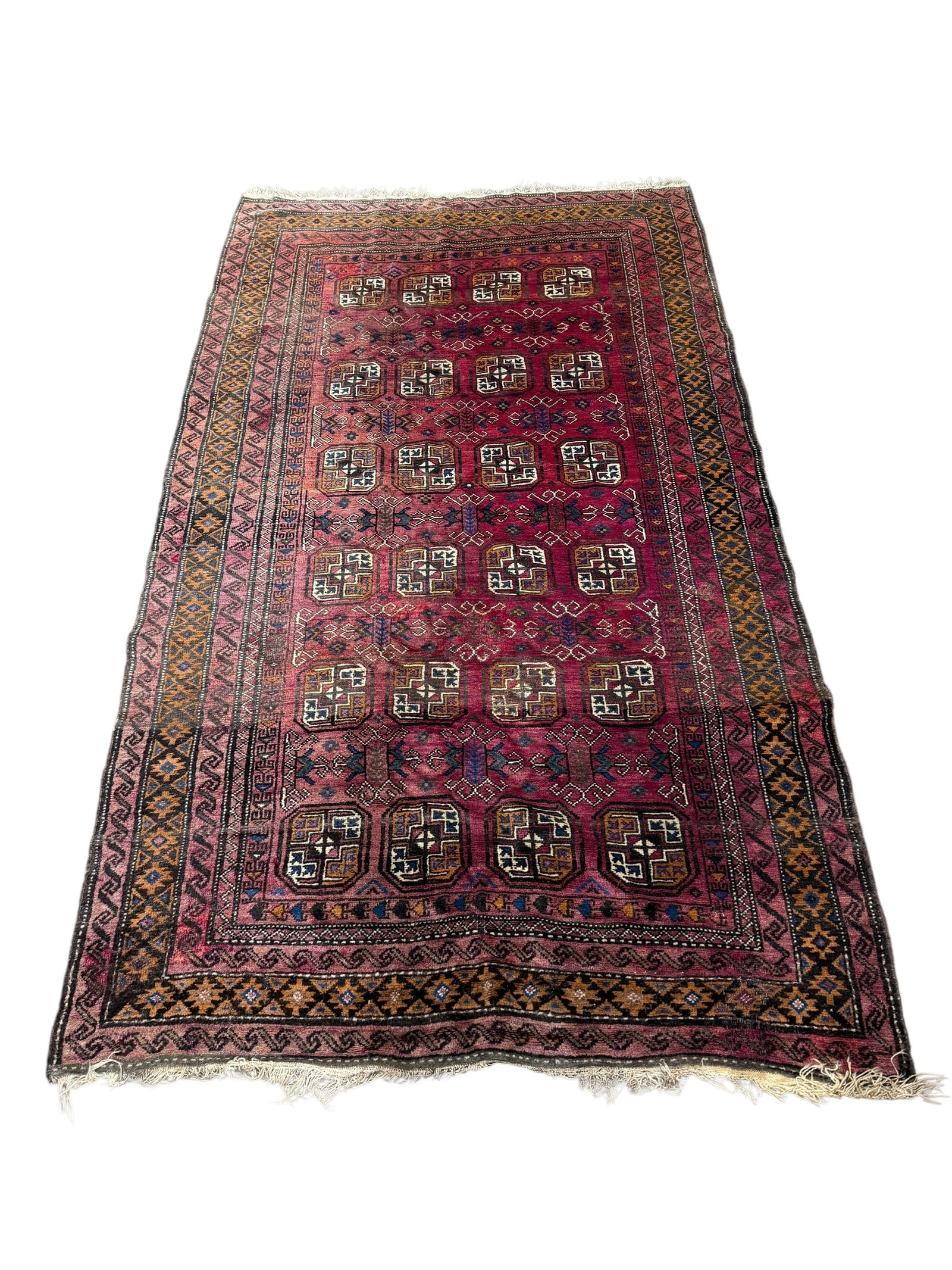 Antique Hand Knotted Persian Rug: Antique Hand Knotted Persian Rug. Meausres 8' 11" x 5' 3". Has some tears, stains and discolor.