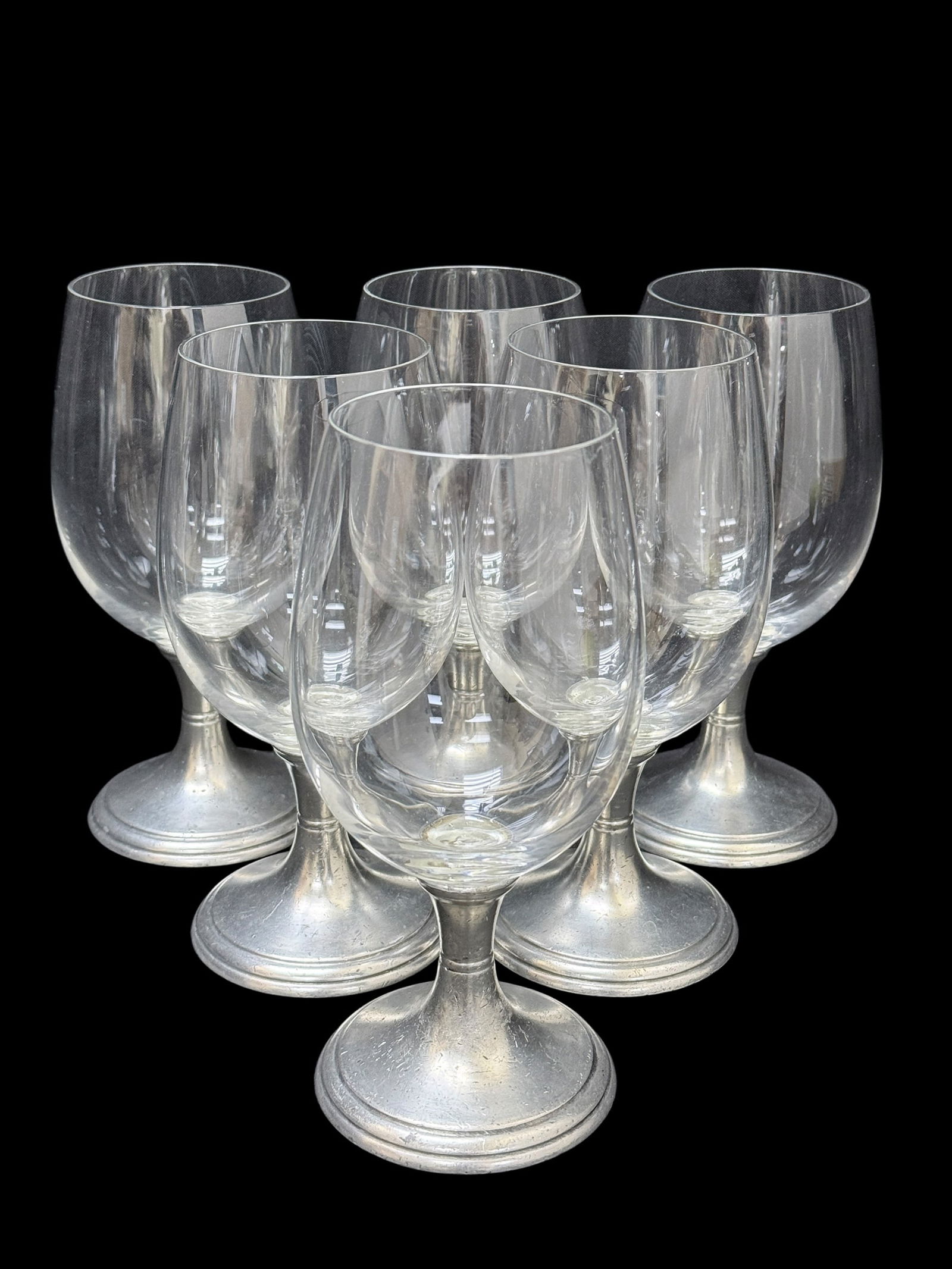 (6) "Arte Italica" Pewter Mounted Crystal Wine Glasses: (6) "Arte Italica" Pewter Mounted Crystal Wine Glasses. Markings on the underside of pewter base. Each Measures 7 5/8" Tall. Pewter base of all have scratches and dings.