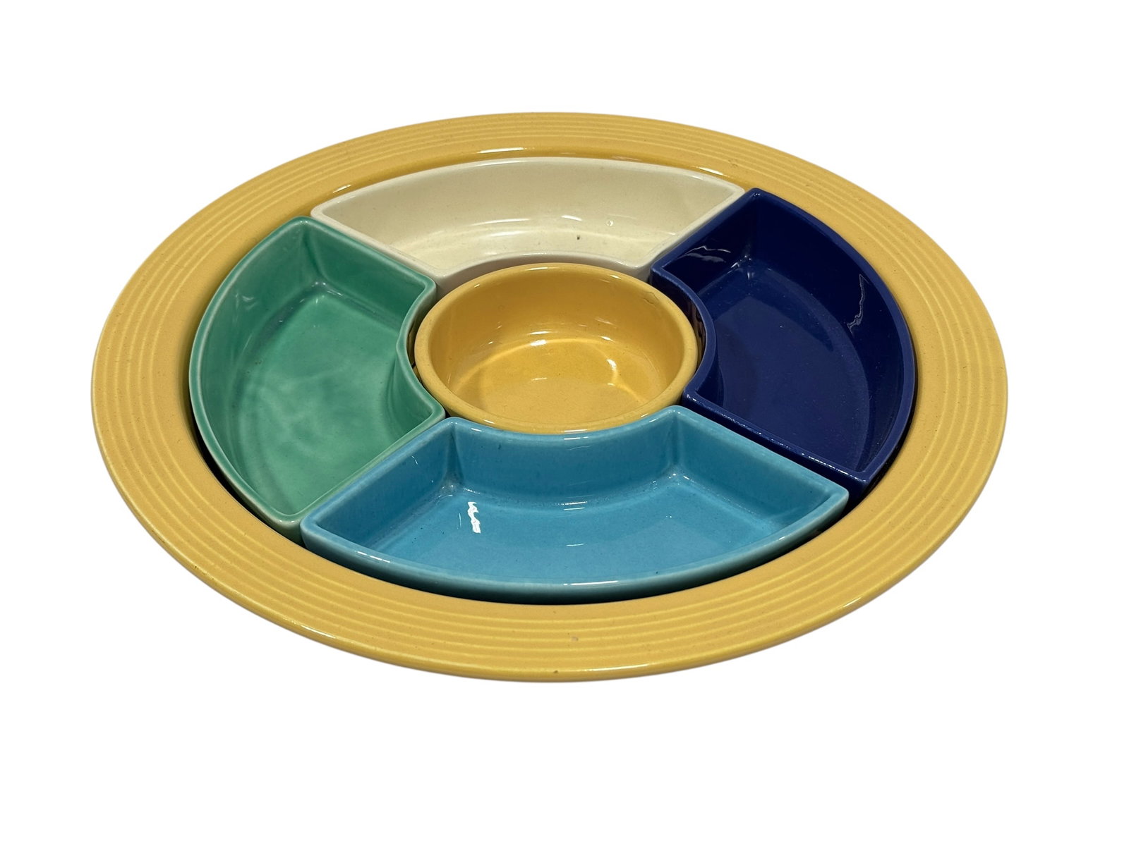 Early Homer Laughlin Fiesta Relish Tray: Early Homer Laughlin Fiesta Relish Tray. Marked on the underside. Measures 1.5" H x 11" Diameter. Has some scuffs.