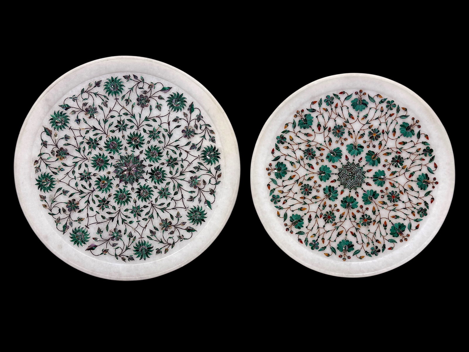 (2) Pietra Dura Inlaid Gemstone Marble Chargers: (2) Pietra Dura Inlaid Gemstone Marble Chargers. Both chargers have a floral and geometric design of gemstones flowing throughout the center of them and multi-colored. Measures 13" Diameter & 14" Diam