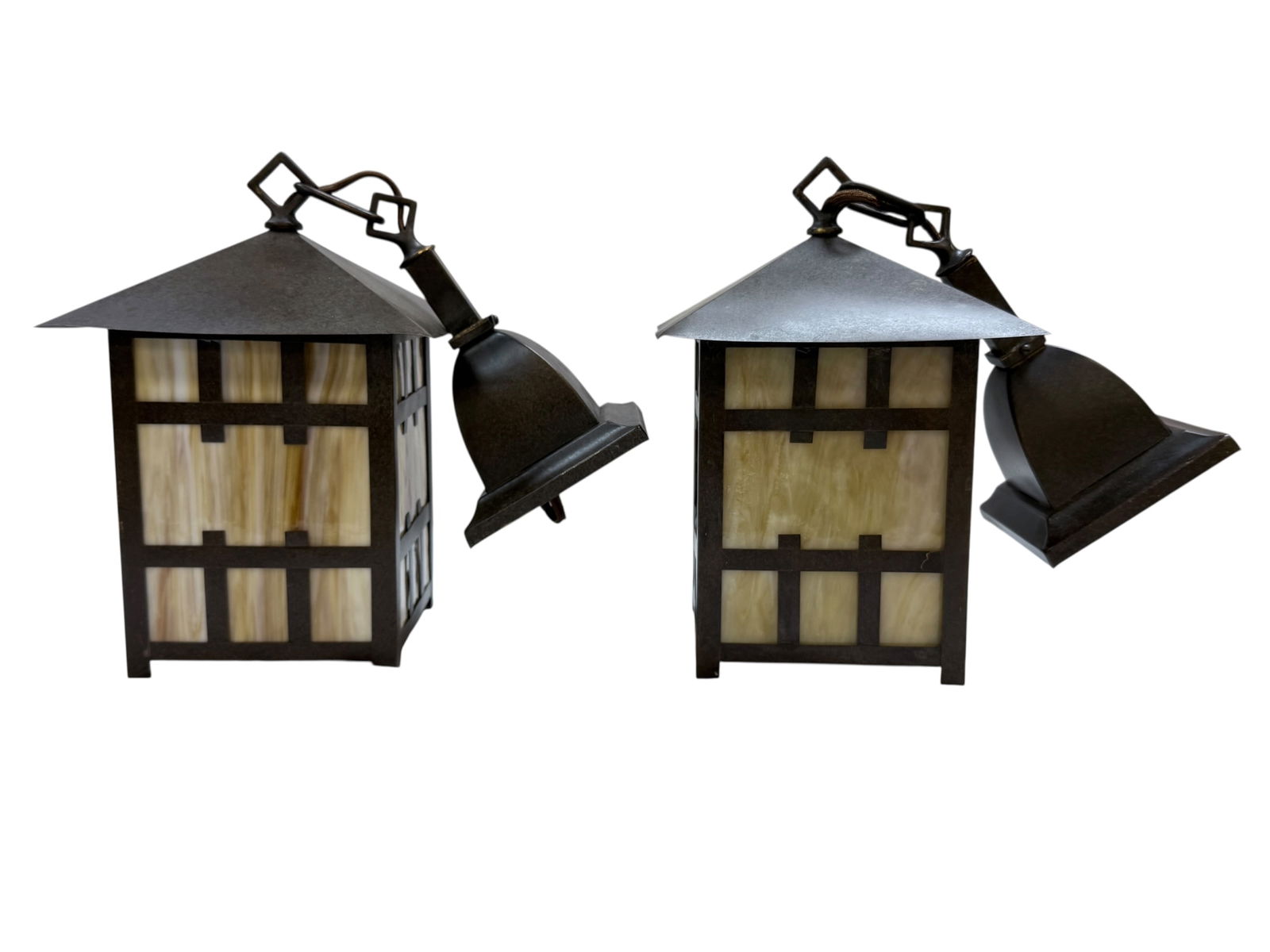 Pair of Arts & Crafts Hanging Slag Glass Lanterns: Pair of Arts & Crafts Hanging Slag Glass Lanterns. Overall measures 19.5" H x 7.5" W x 7.5" D. Lights measure 10.75" Tall. Both have some light scratches and a few bends on corners of top.