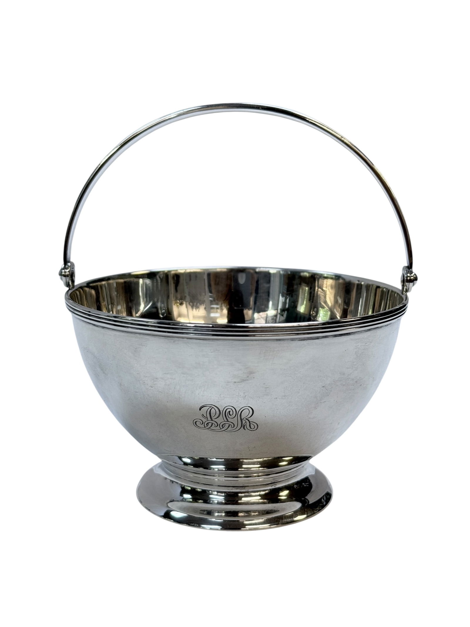 Signed Tiffany & Co. Sterling Basket: Signed Tiffany & Co. Sterling Basket. Marked "Tiffany & Co. 16423 B Makers 1504 Sterling Silver 925-1000 m 7025" on the underside. Measures 5.25" H x 4.5" Diameter. Has scratches. Total weight: 7.16 O
