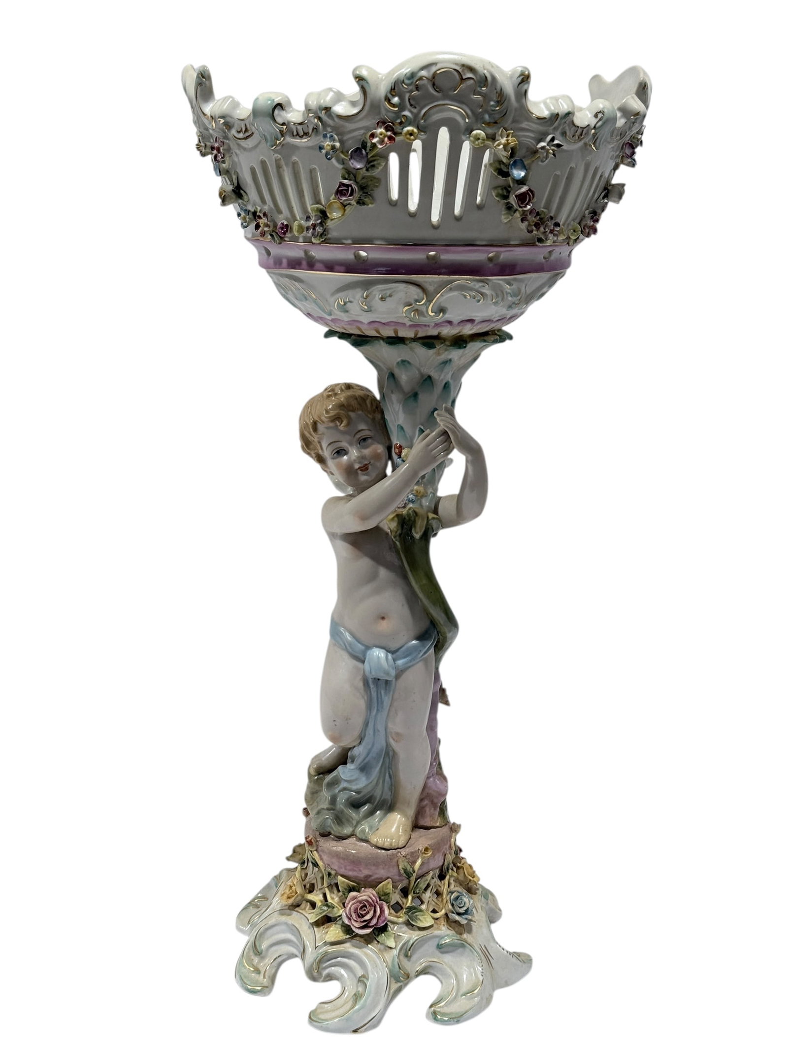 Antique Meissen Porcelain Cherub Figural Pierced Centerpiece: Antique Meissen Porcelain Cherub Figural Pierced Centerpiece. Marked on the underside. Possibly Late 19th C. Measures 22" H x 10.25" W x 10.5" D. Has some scuffs.