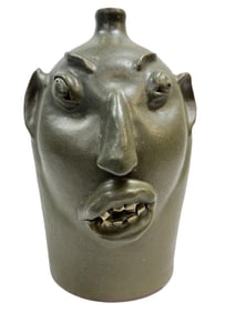 Signed Louis Brown Pottery Face Jug