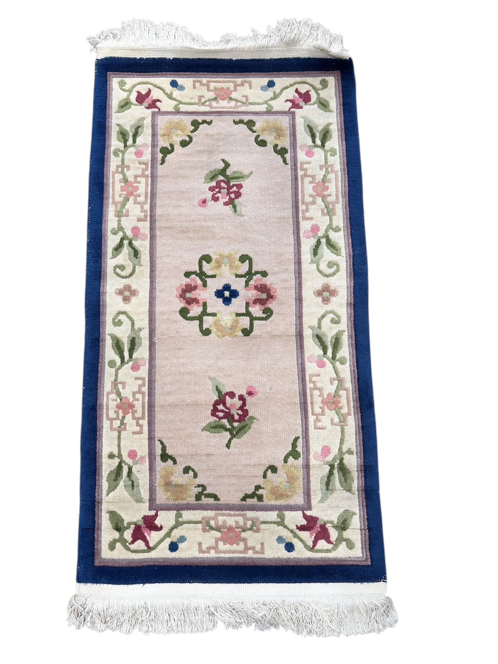 Hand Knotted Wool Rug: Hand Knotted Wool Rug. Measures: 4' 7" x 2'. Has some fraying to knotting.