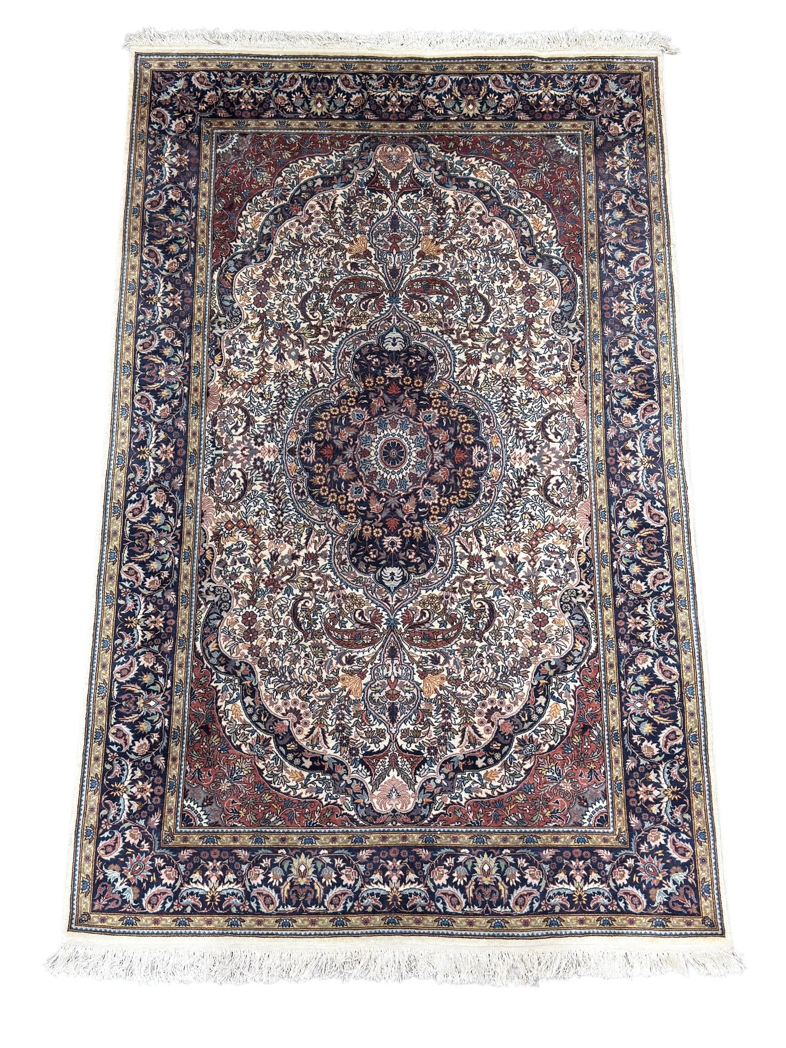 Mid-century Hand Knotted Persian Isfahan Rug: Mid-century Hand Knotted Persian Isfahan Rug. Measures 7' 6" x 4' 6". Light fraying on the edges, discoloration on tassels.