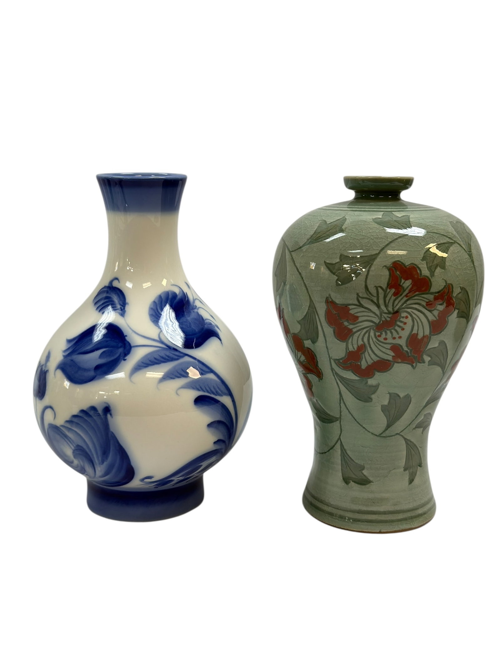 Blue White Vase & Celadon Vase: Blue White Vase & Celadon Vase. Lomonosov Porcelain Blue & White Vase is marked Made in Russia on the underside, measures 6.75" Tall and in good condition. Chinese Celadon Vase measures 6.75" Tall and