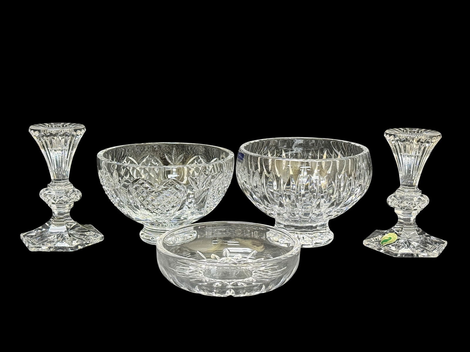Group of 5 Waterford Crystal Pieces: Group of 5 Waterford Crystal Pieces. All pieces are marked. 2 Bowls measure 4" H x 6" Diameter & 4" H x 5.75" Diameter. Pair of Candle sticks measure 5" Tall. Trinket Dish measures 1.5" H x 5.25" Diam