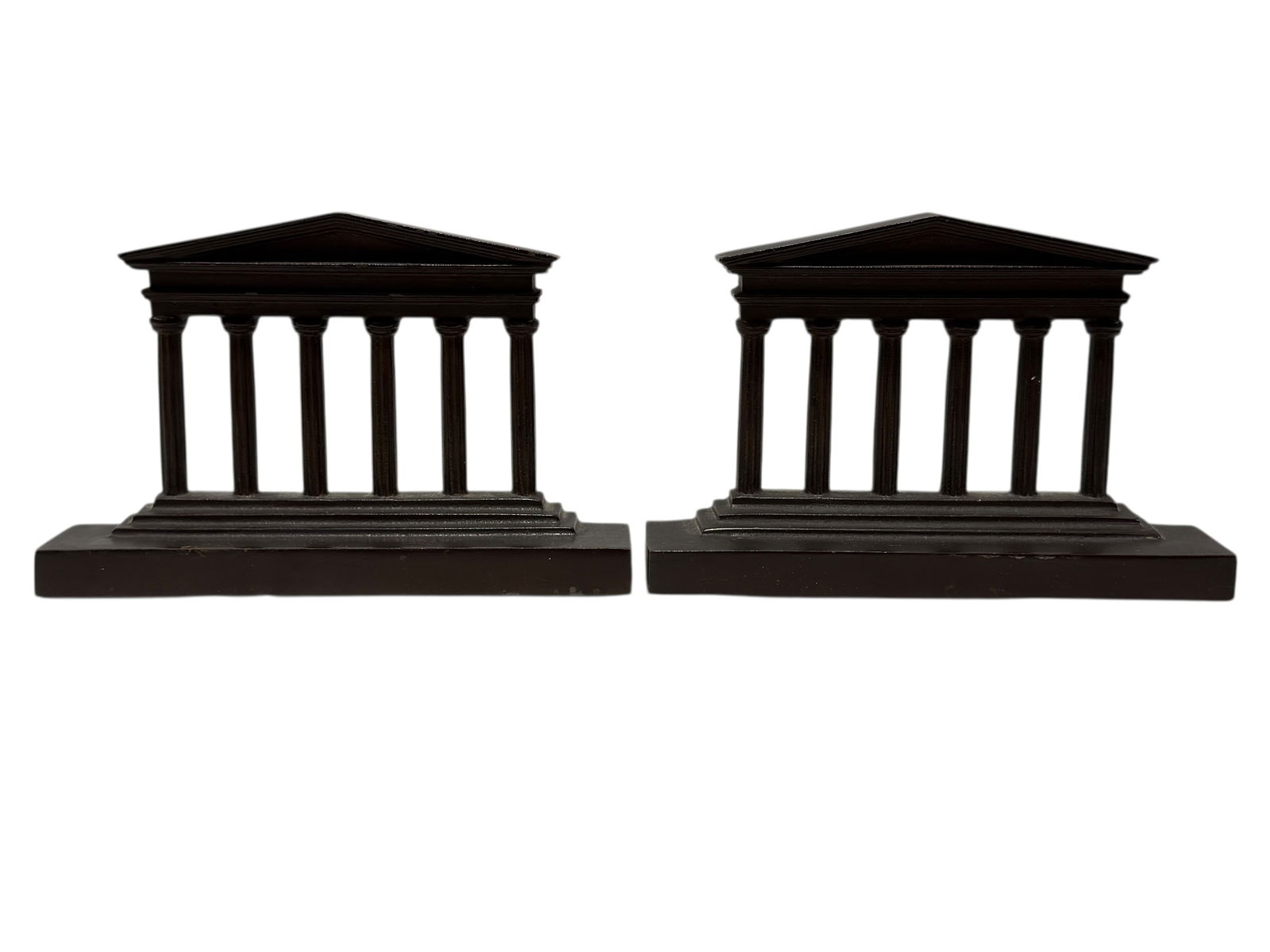 Pair of Bronze Greek Column Bookends: Pair of Bronze Greek Column Bookends. Measures 4.5" H x 7" W x 1.75" D. Has some scuffs and scratches.