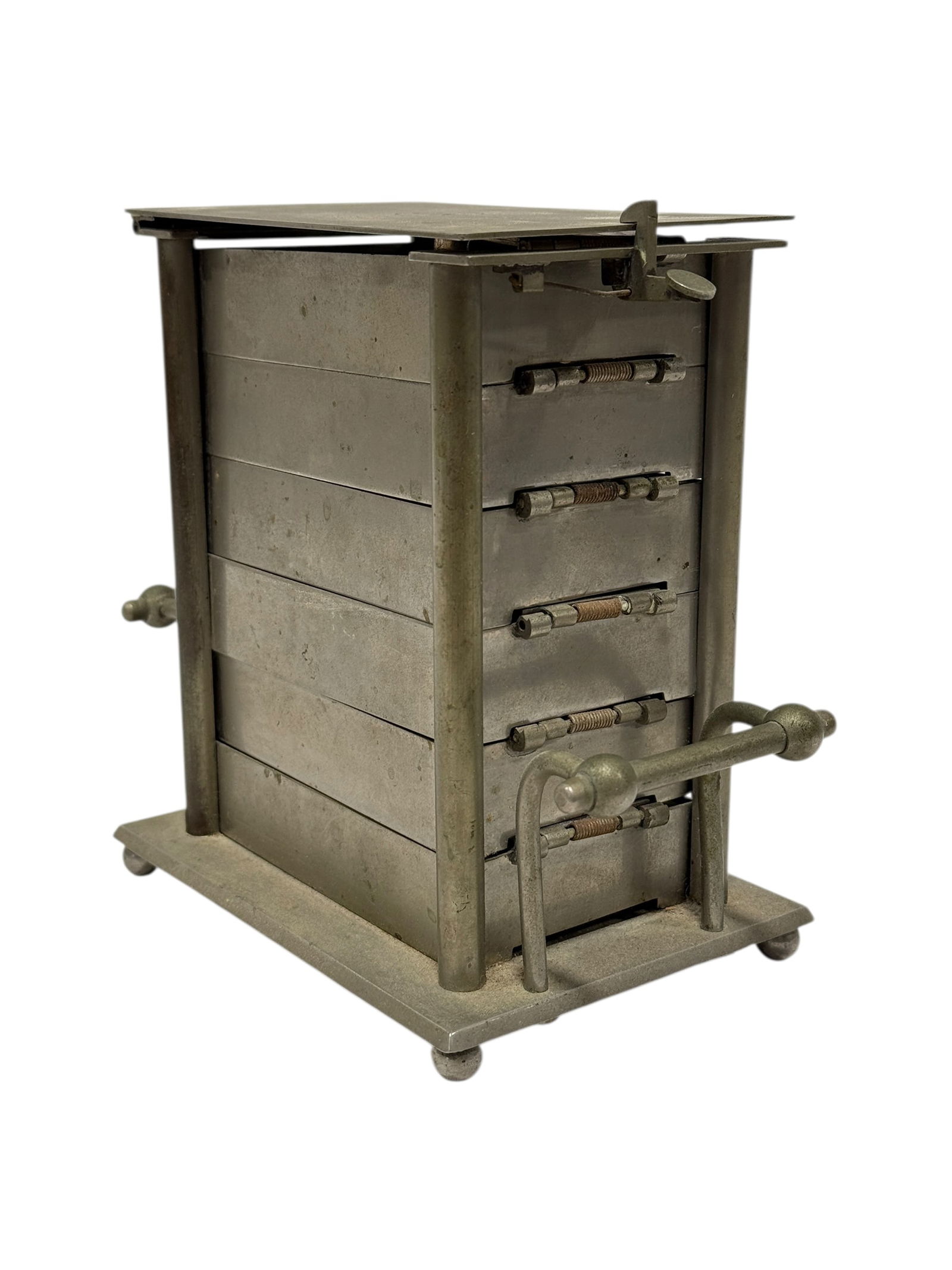 Franz Hiess & Söhne Wein Machine of Smokers Stands: Franz Hiess & Söhne Wein Machine of Smokers Stands. Marked on the underside of lid. 7 Pieces set, 6 ashtrays with glass inserts and match box holders. Overall measures 6.5" H x 7.75" W x 4.25" D. In