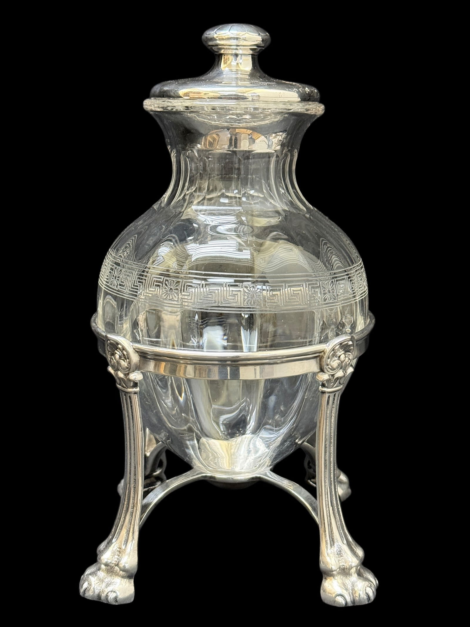 RARE Fine Marshall Field & Co. Crystal & Silverplate Decanter: RARE Fine Marshall Field & Co. Crystal & Silverplate Decanter. Silverplate top and stand. Marked "Made by Marshall Field & Co. Chicago" on the underside on stand. Measures 10.25" H x 5.5" W x 5.5" D.