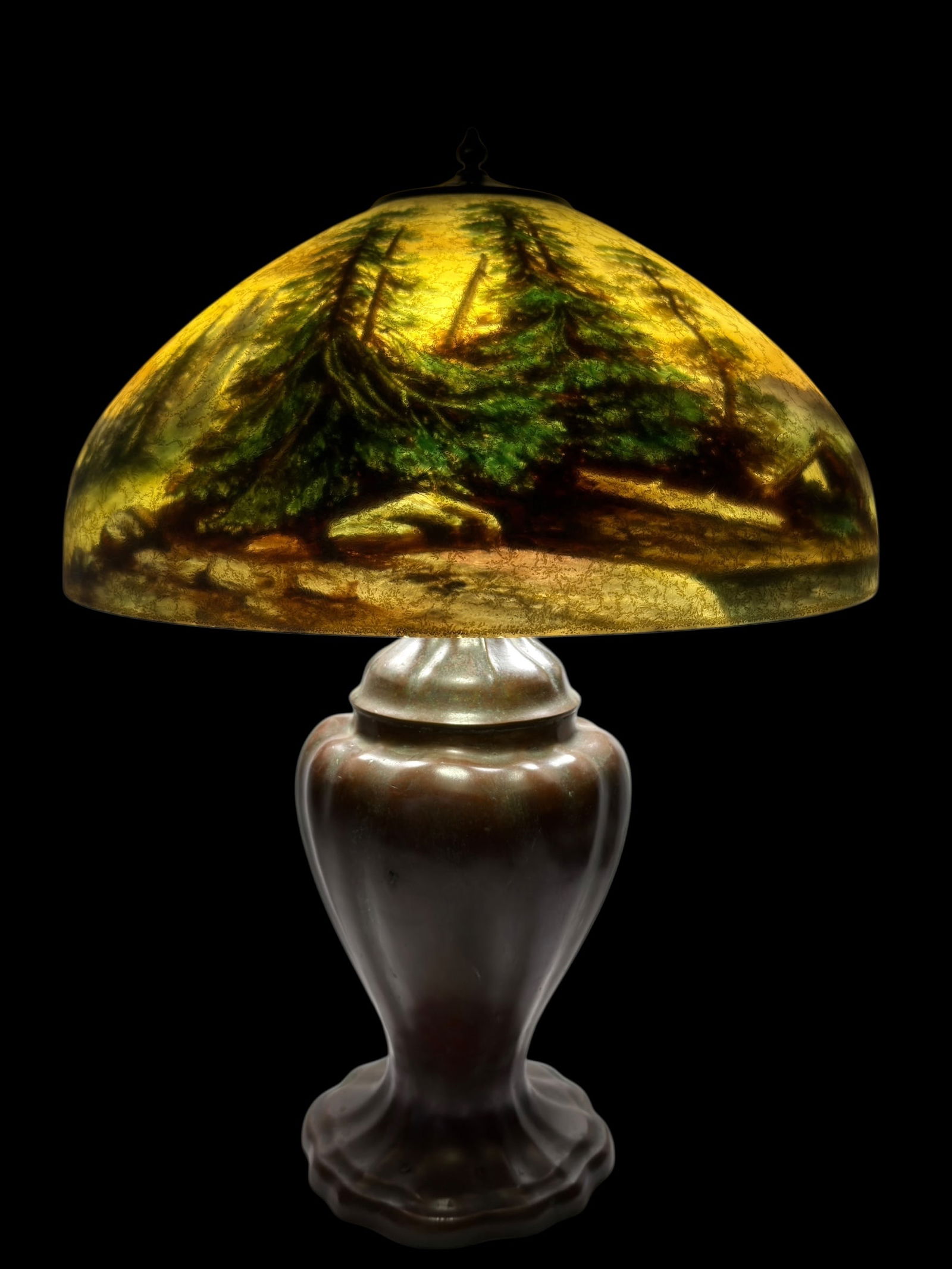 Signed Handel Fine Cir 1910 Reverse Painted Shade & Bronze Base Lamp: Signed Handel Fine Cir 1910 Reverse Painted Shade & Bronze Base Lamp. Pine Trees and shore reverse painted lamp shade signed 'Handel 6323' on the inside of shade, fitter ring is signed 'Handel Pat'd N