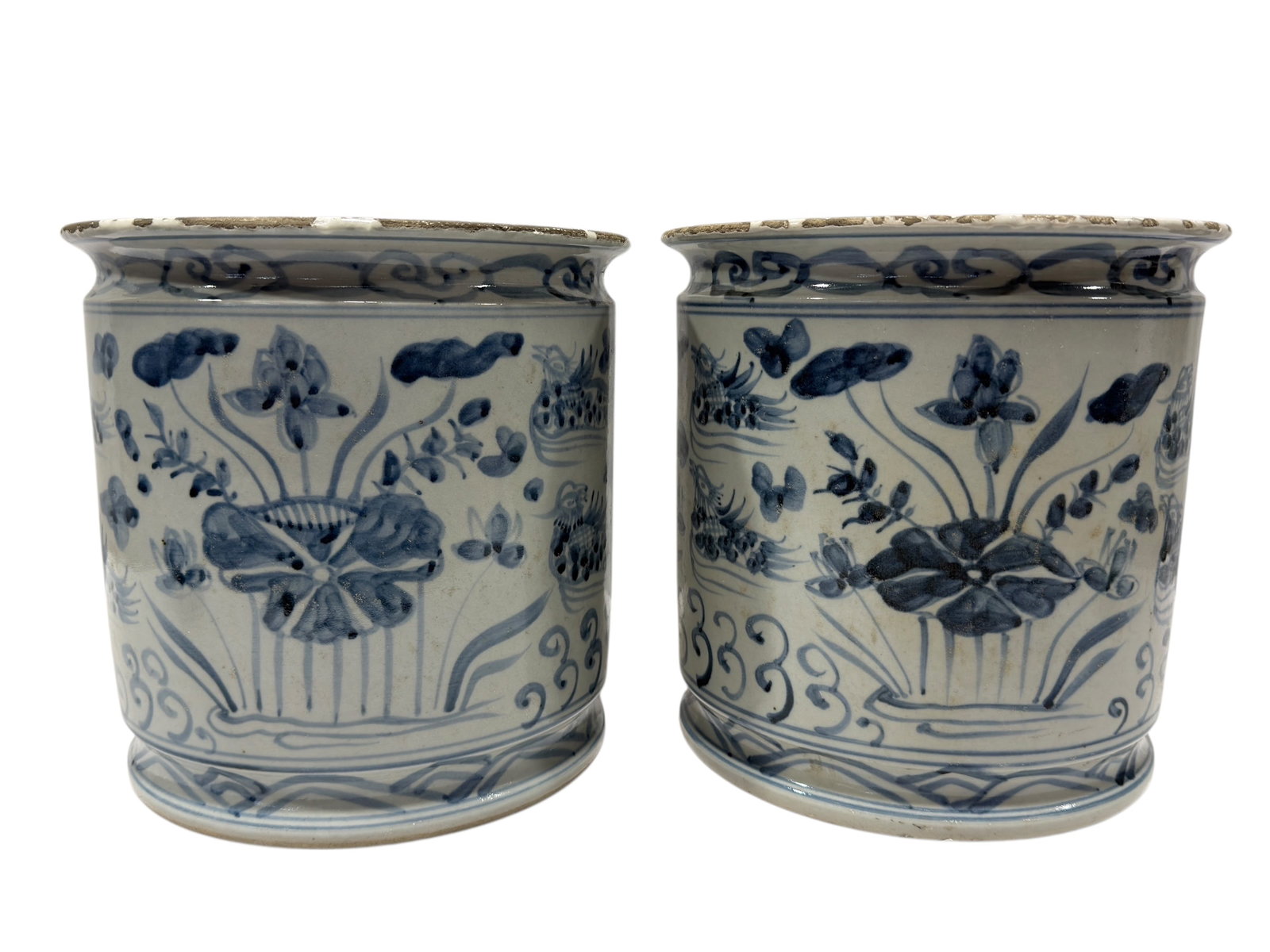 Pair of 19th C. Chinese Lily Pad & Mandarin Duck Planters: Pair of 19th C. Chinese Lily Pad & Mandarin Duck Planters. Measures 9.5" H x 9.5" Diameter. Has some chips around edges, condition reflects its age.