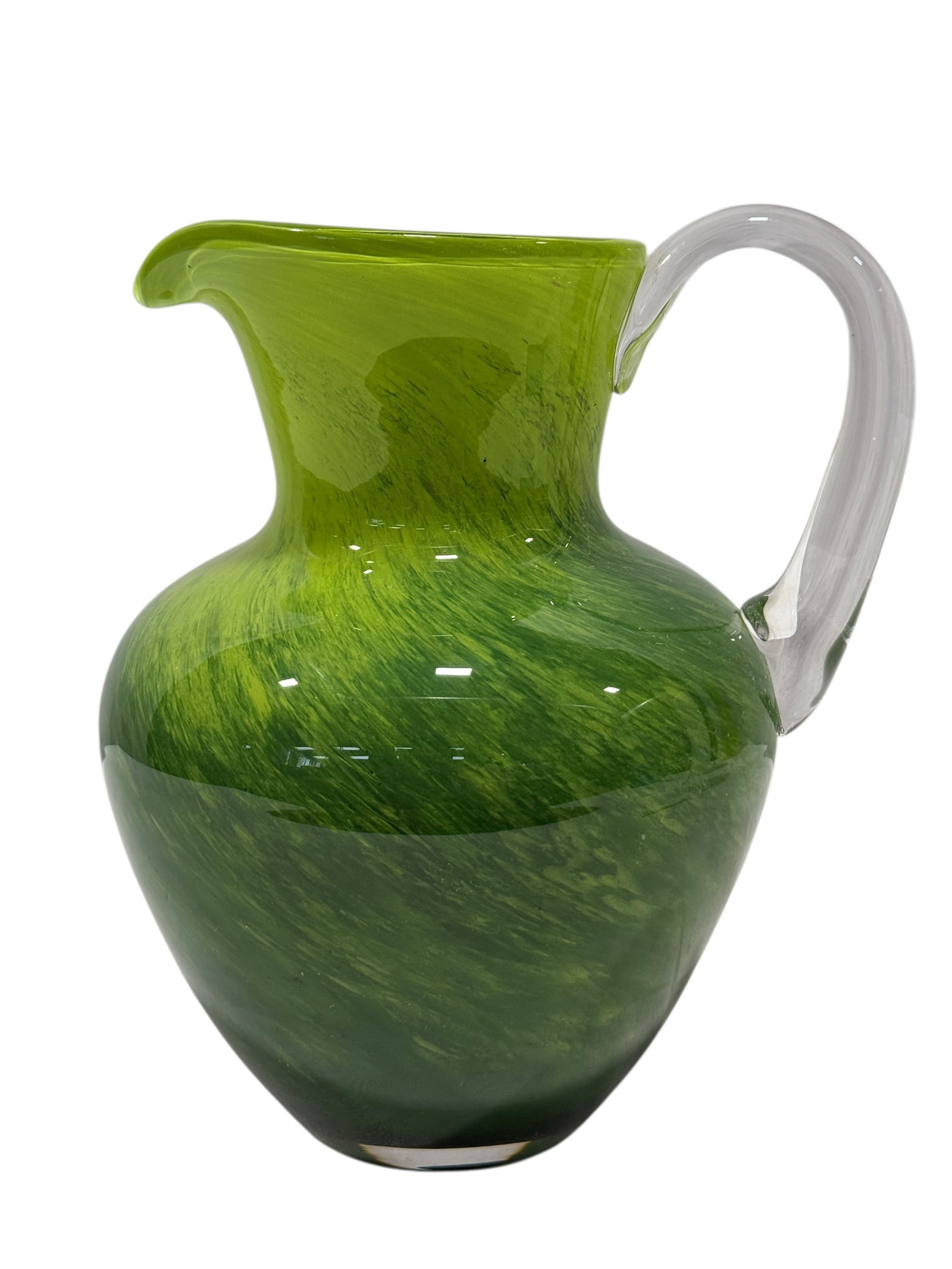 Hand Blown Green Art Glass Murano Style Pitcher: Hand Blown Green Art Glass Murano Style Pitcher. Measures 9.25" H x 8" W x 6.75" D. In good condition.