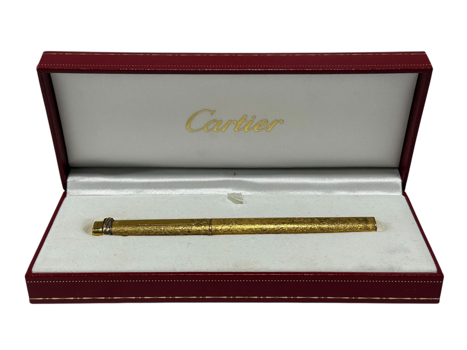 Gold Plated Cartier Pen w/ Case: Gold Plated Cartier Pen w/ Case. Pen is marked and measures 5.25" Long. Case measures 1.5" H x 7" W x 3" D.