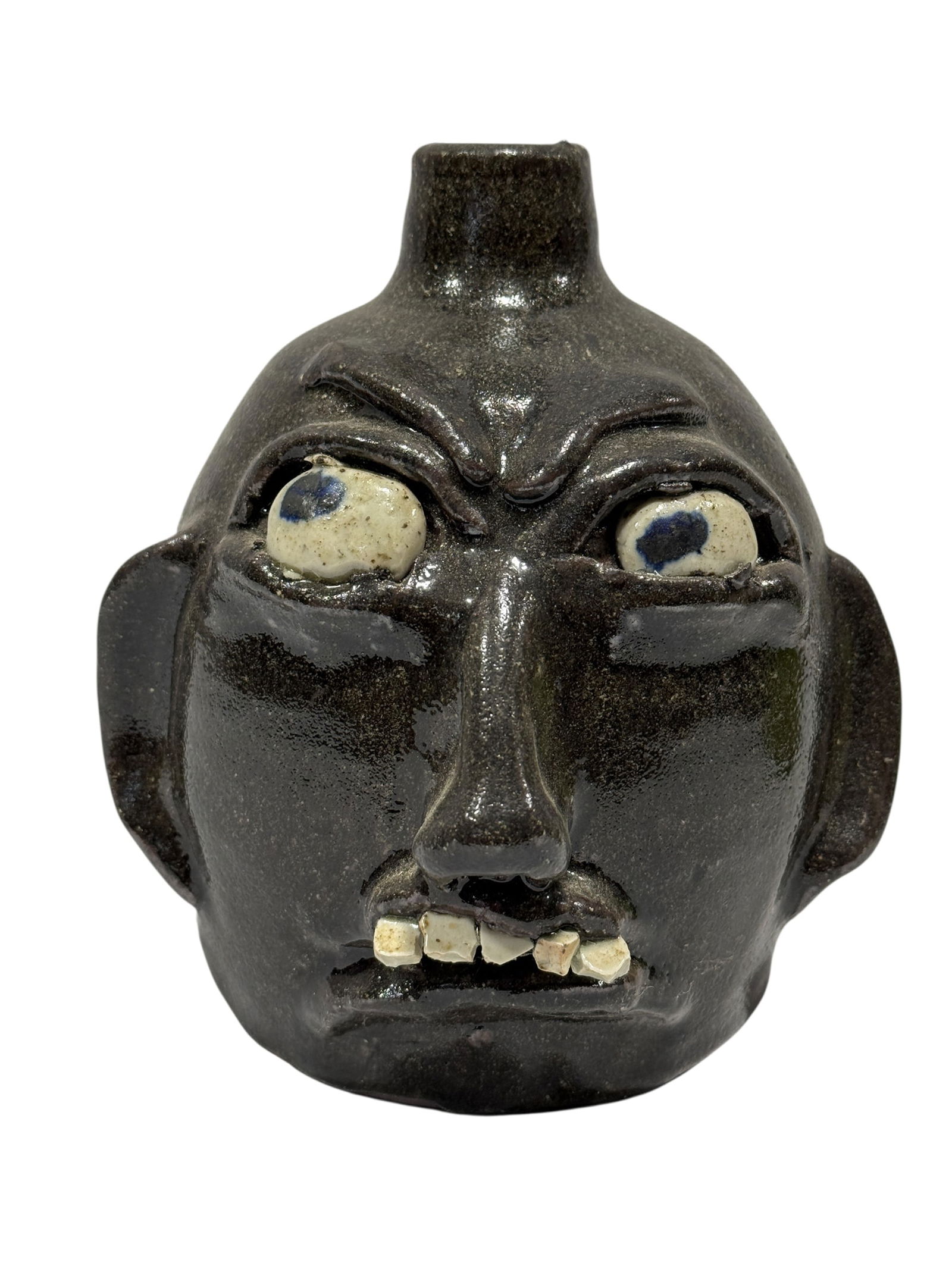 Signed B.R. Holcomb Pottery Face Jug: Signed B.R. Holcomb Pottery Face Jug. Signed B.R. Holcomb Kilm Burner on the underside. Measures 6.5" H x 5.75" W x 6.5" D. In good condition.