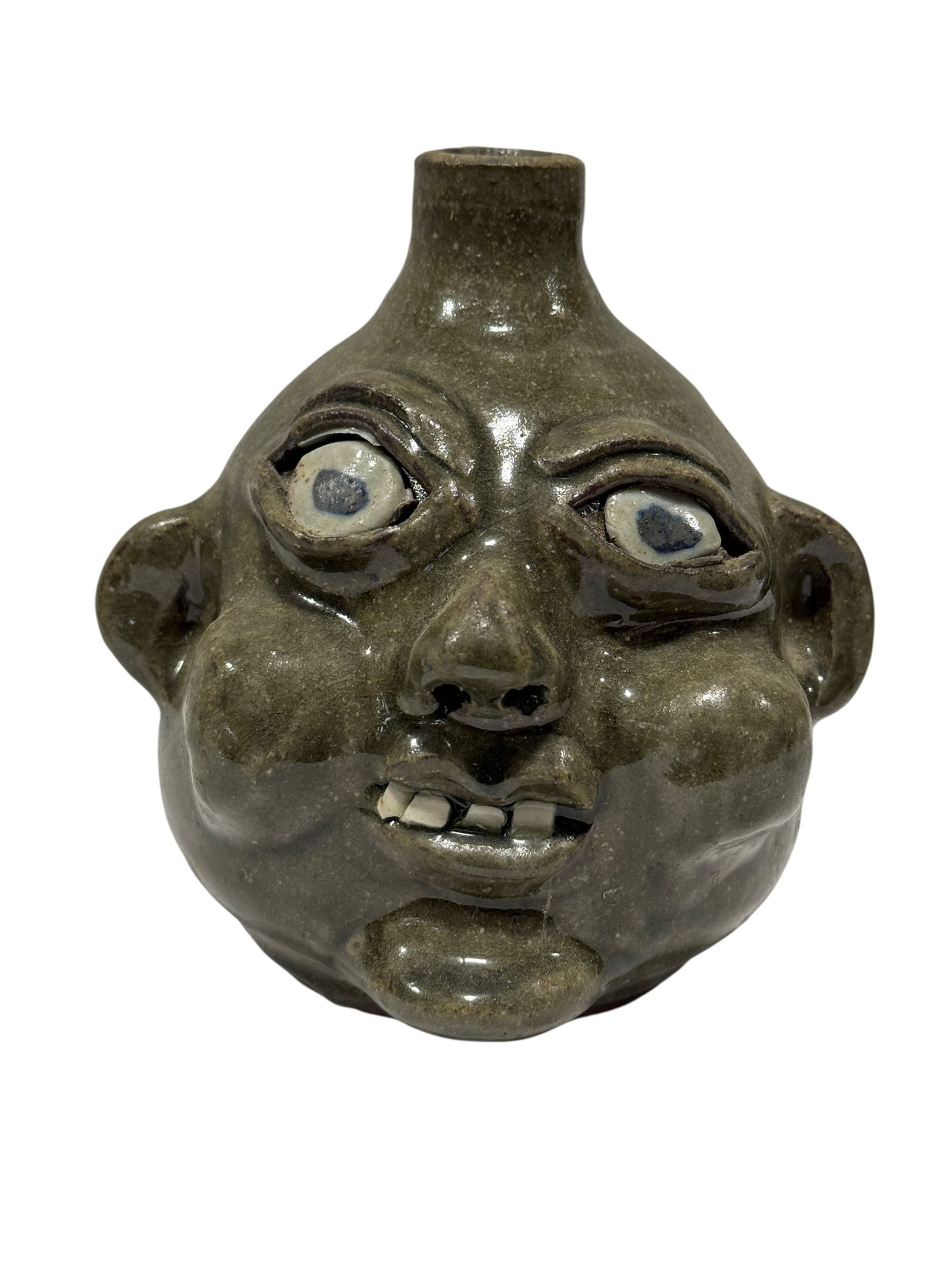 Signed Grace Nell Hewell Pottery Face Jug: Signed Grace Nell Hewell Pottery Face Jug. Singed on the underside. Measures 5.5" H x 5.25" W x 4.5" D. In good condition.