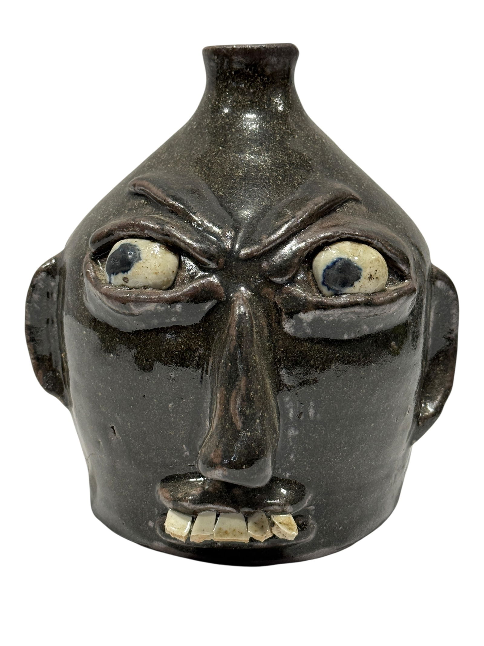 Signed B.R. Holcomb Pottery Face Jug: Signed B.R. Holcomb Pottery Face Jug. Signed B.R. Holcomb Kilm Burner on the underside. Measures 6.5" H x 6" W x 6.75" D. In good condition.