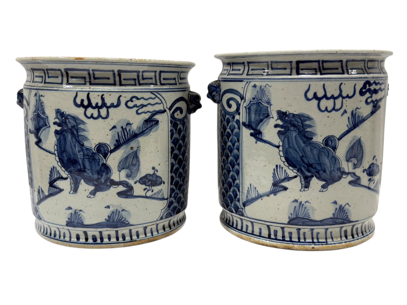 Pair of Early Blue & White Kylin Orchid Pots: Pair of Early Blue & White Kylin Orchid Pots. Measures 9.5" H x 10" W x 9" D. In good condition.