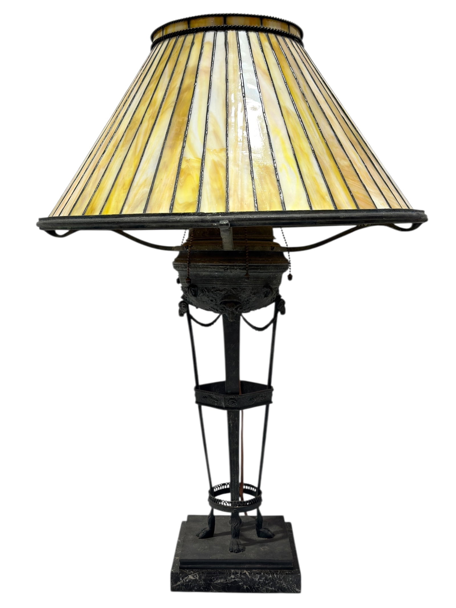 Large Arts & Crafts Bronze Slag Glass Lamp In The Style of E.F. Caldwell: Large Arts & Crafts Bronze Slag Glass Lamp In The Style of E.F. Caldwell. Arts & Crafts–style table lamp executed in the manner of E.F. Caldwell, featuring a substantial conical leaded slag glass sh