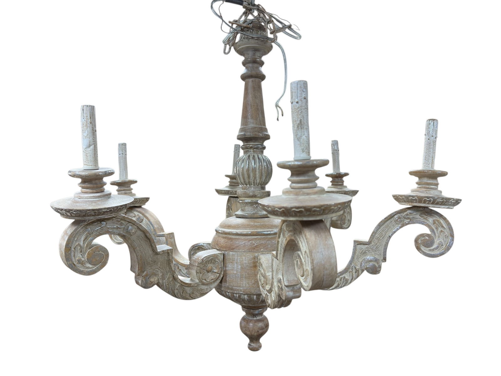 Mid Century Italian Carved Wood Chandelier: Mid–20th century Italian carved wood chandelier featuring scrolling arms with classical foliate and rosette detailing, finished in a softly distressed painted surface with visible age patina. The ch