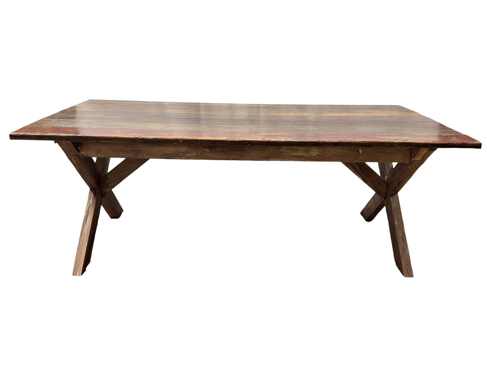 Reclaimed Wood Trestle Dining Table: Large custom trestle-style dining table constructed from reclaimed wood planks, featuring a rectangular top with visible grain, wear, and remnants of original painted surfaces. The table rests on subs