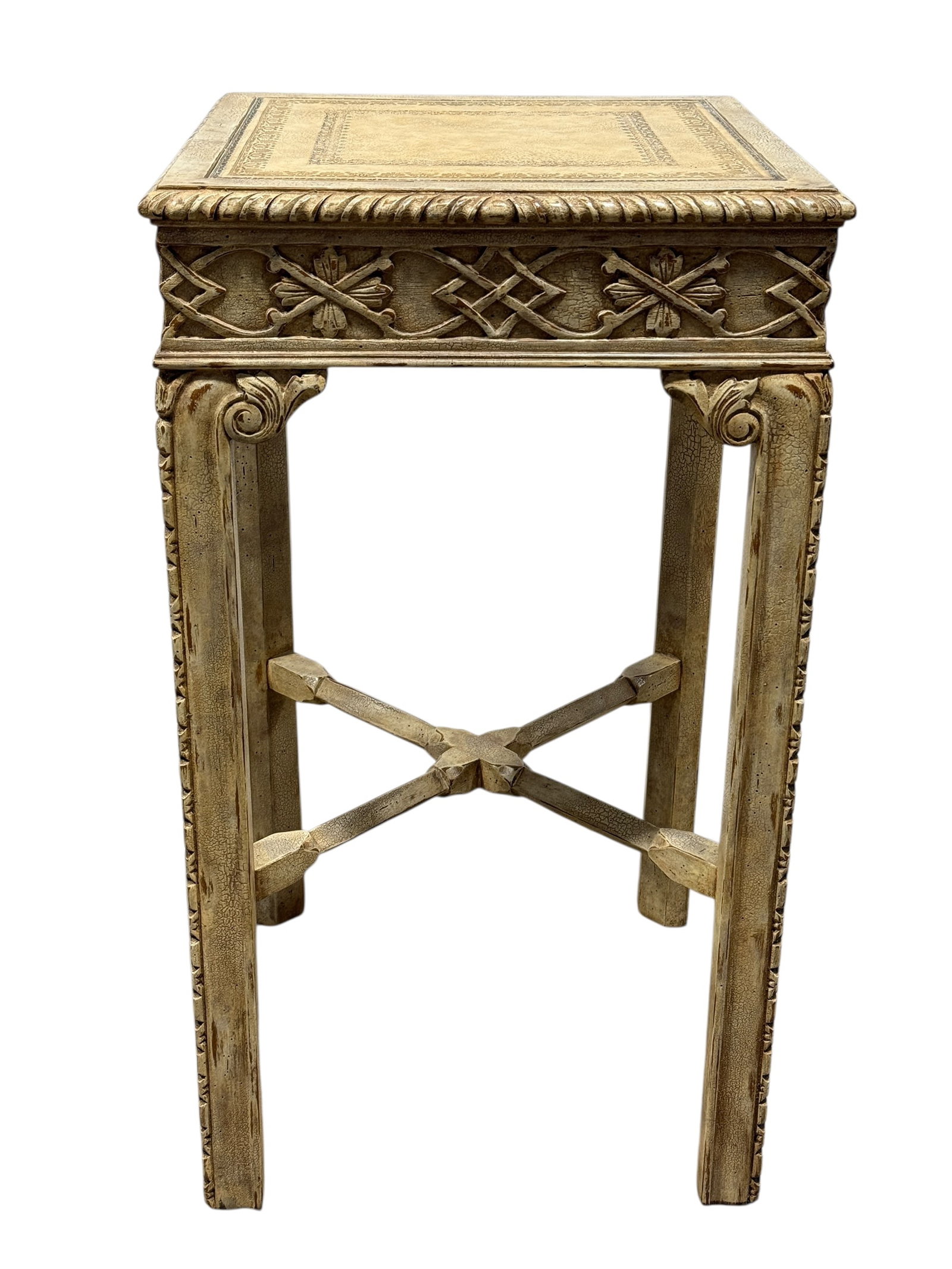 Leather Top Chippendale-Style Painted Side Table: This decorative side table is made in the Chippendale style and features a rectangular tooled leather-inset top with gilt and dark decorative borders, framed by a molded rope-edge surround. The apron 