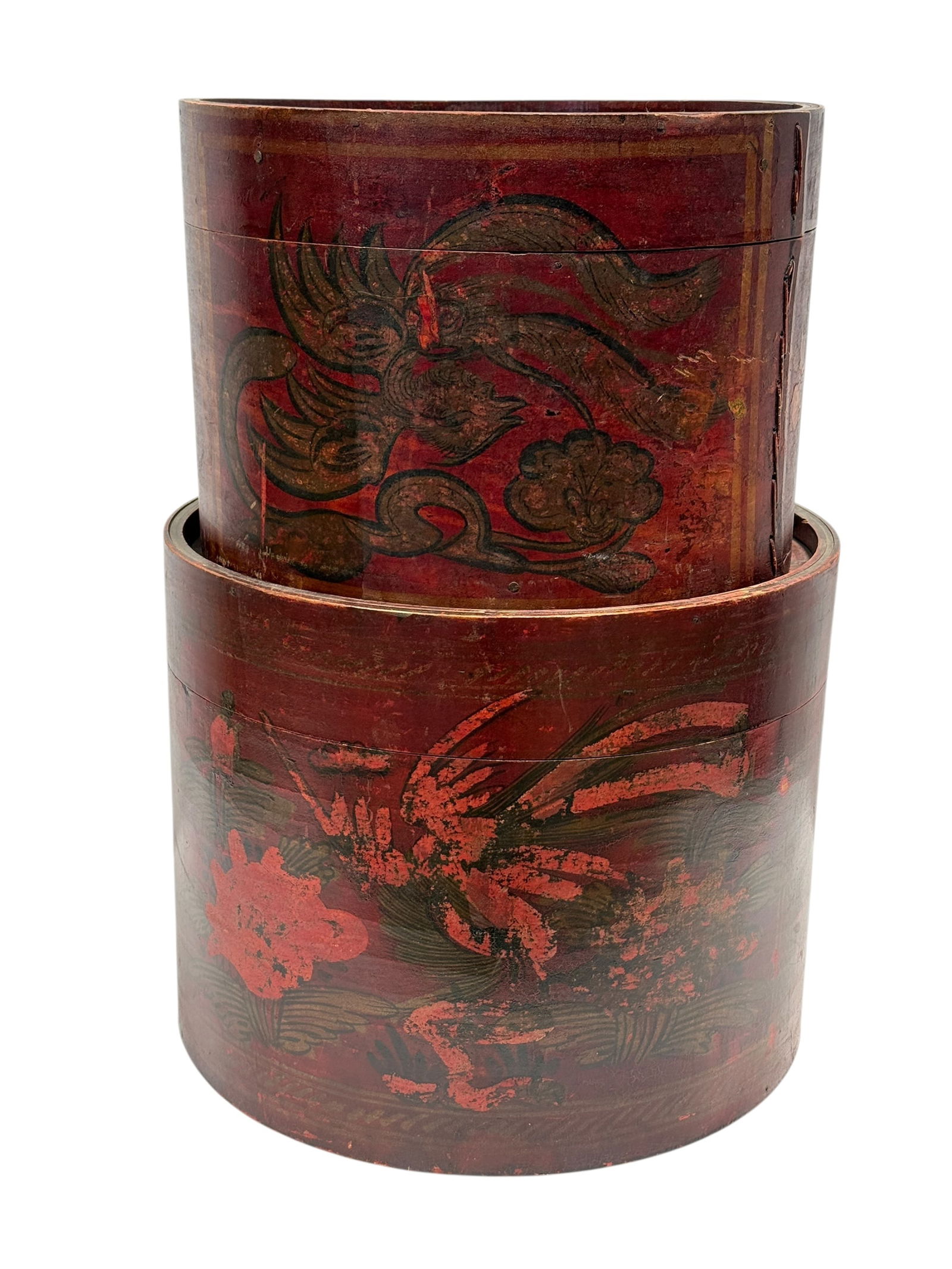 Pair of 20th C. Chinese Red Lacquered Cylindrical Boxes: A decorative pair of Chinese red lacquered cylindrical boxes, likely dating to the mid–20th century, each constructed of bentwood with fitted lids. The exterior surfaces are finished in deep red lac