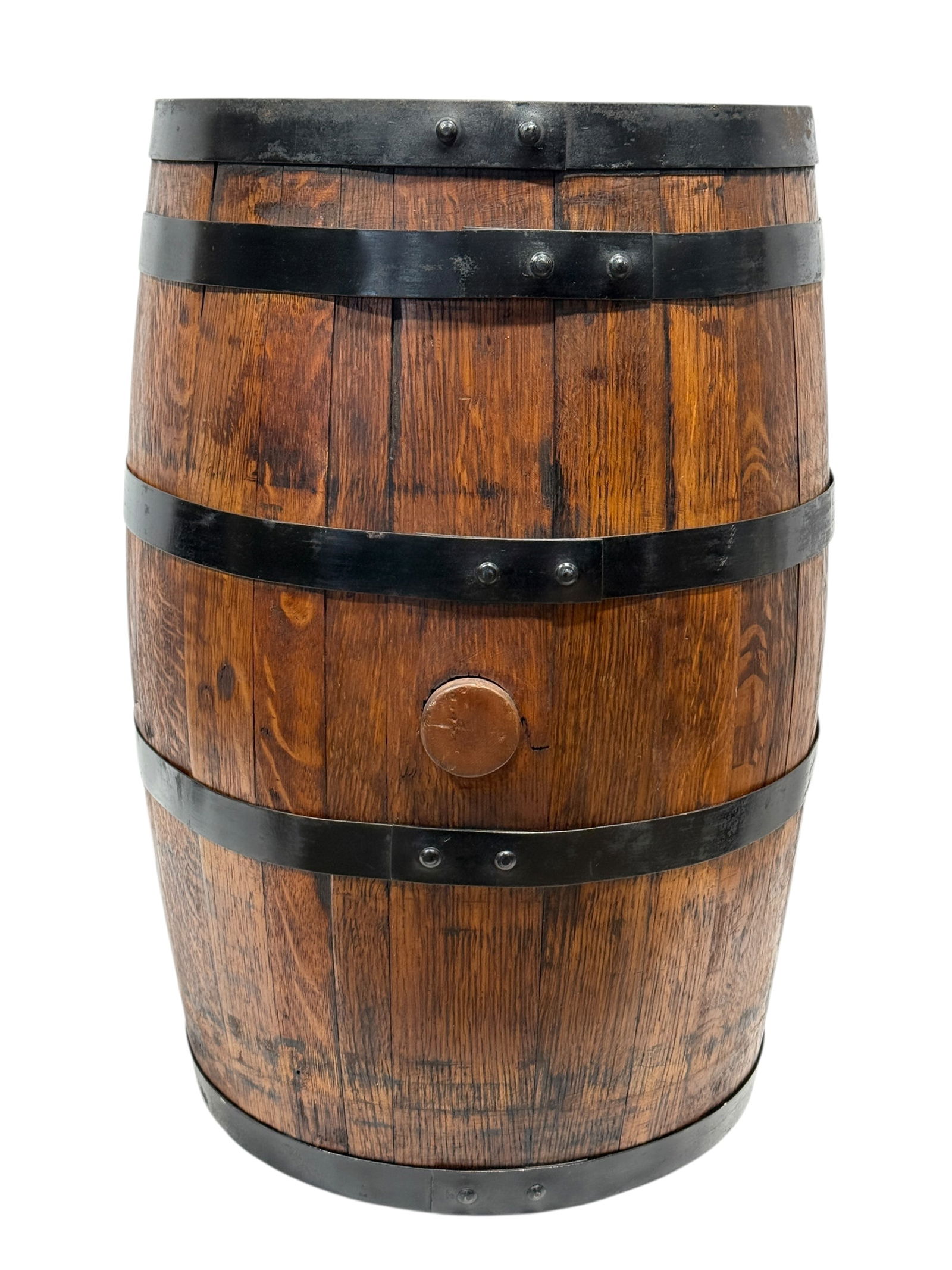 Late 19th Century Oak Barrel w/ Iron Bands: This late 19th century oak barrel, dating to approximately circa 1880–1900, is constructed from solid oak staves secured with original iron bands. The barrel retains its authentic utilitarian form,