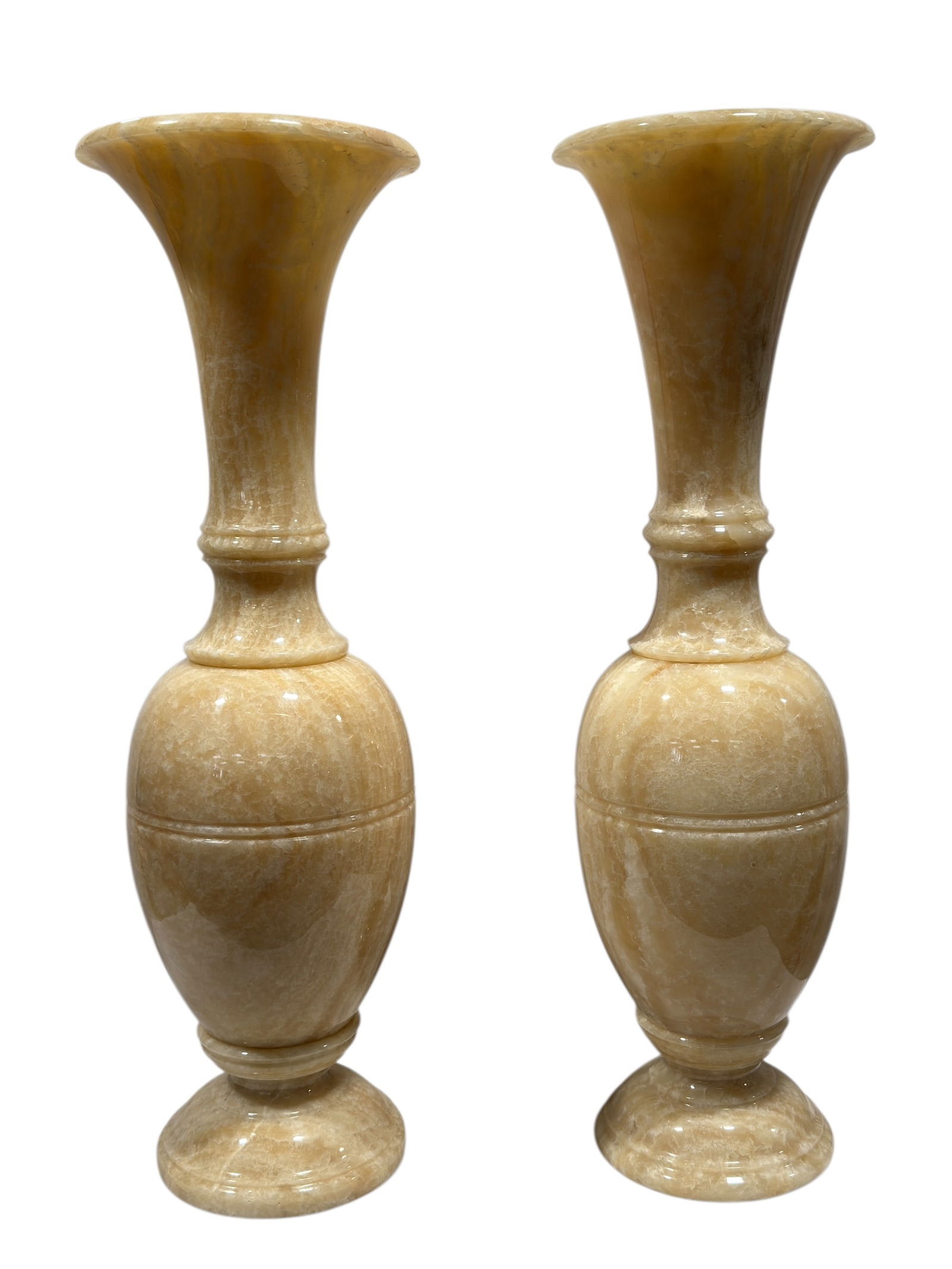 Pair of Monumental Vintage 2Pc Alabaster Lamps: Striking pair of large-scale vintage alabaster lamps, each crafted in two substantial sections from richly veined honey-toned alabaster. These sculptural lamps feature elegant flared tops, baluster-fo