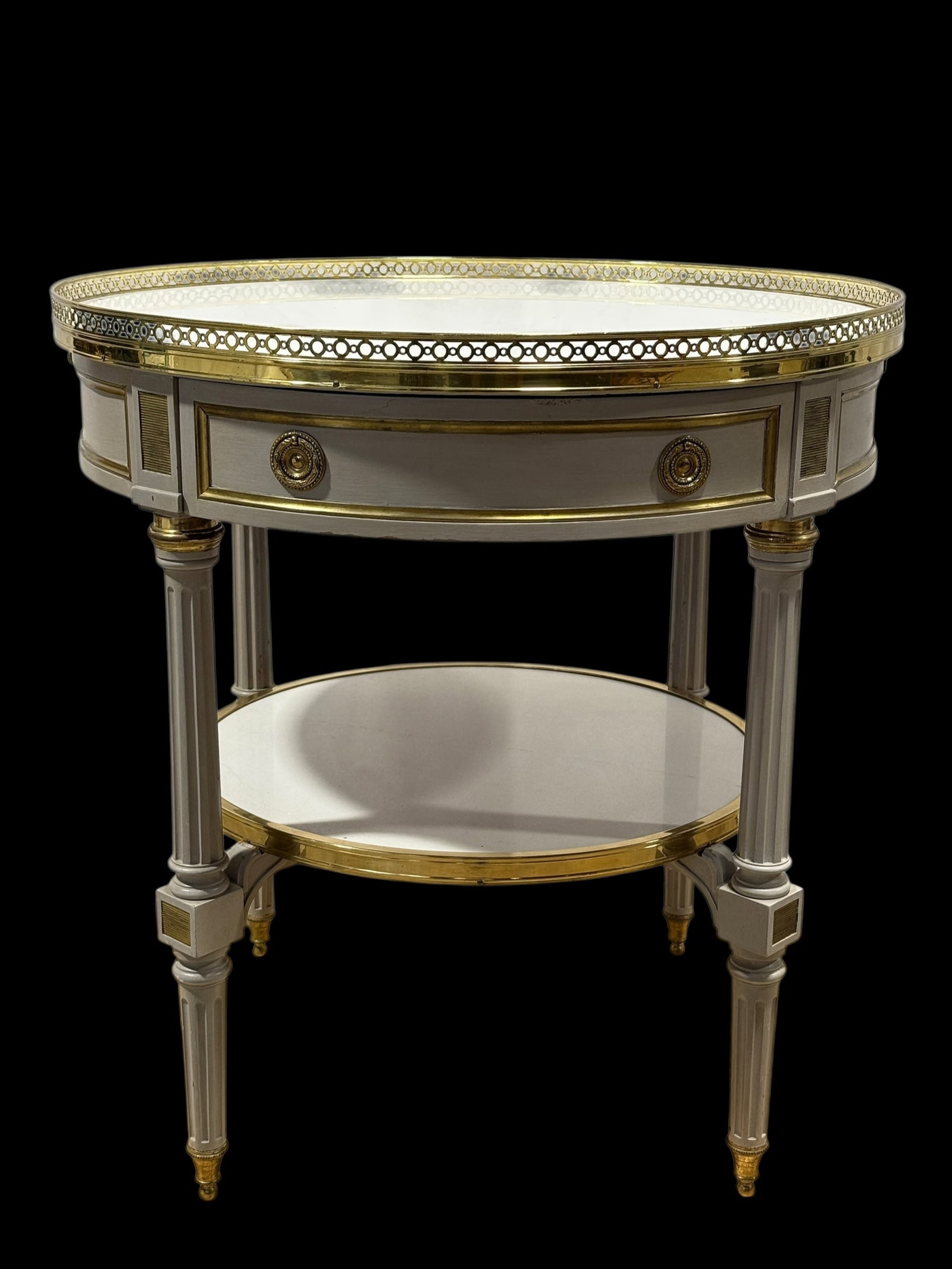 20th C. French Style Painted Bouillotte Table w/ Marble Top: A refined French-style painted Bouillotte table, executed in the Jansen taste, produced as a facsimile reproduction by Frederick P. Victoria & Sons, Inc., New York, as stamped 'Frederick P. Victoria' 