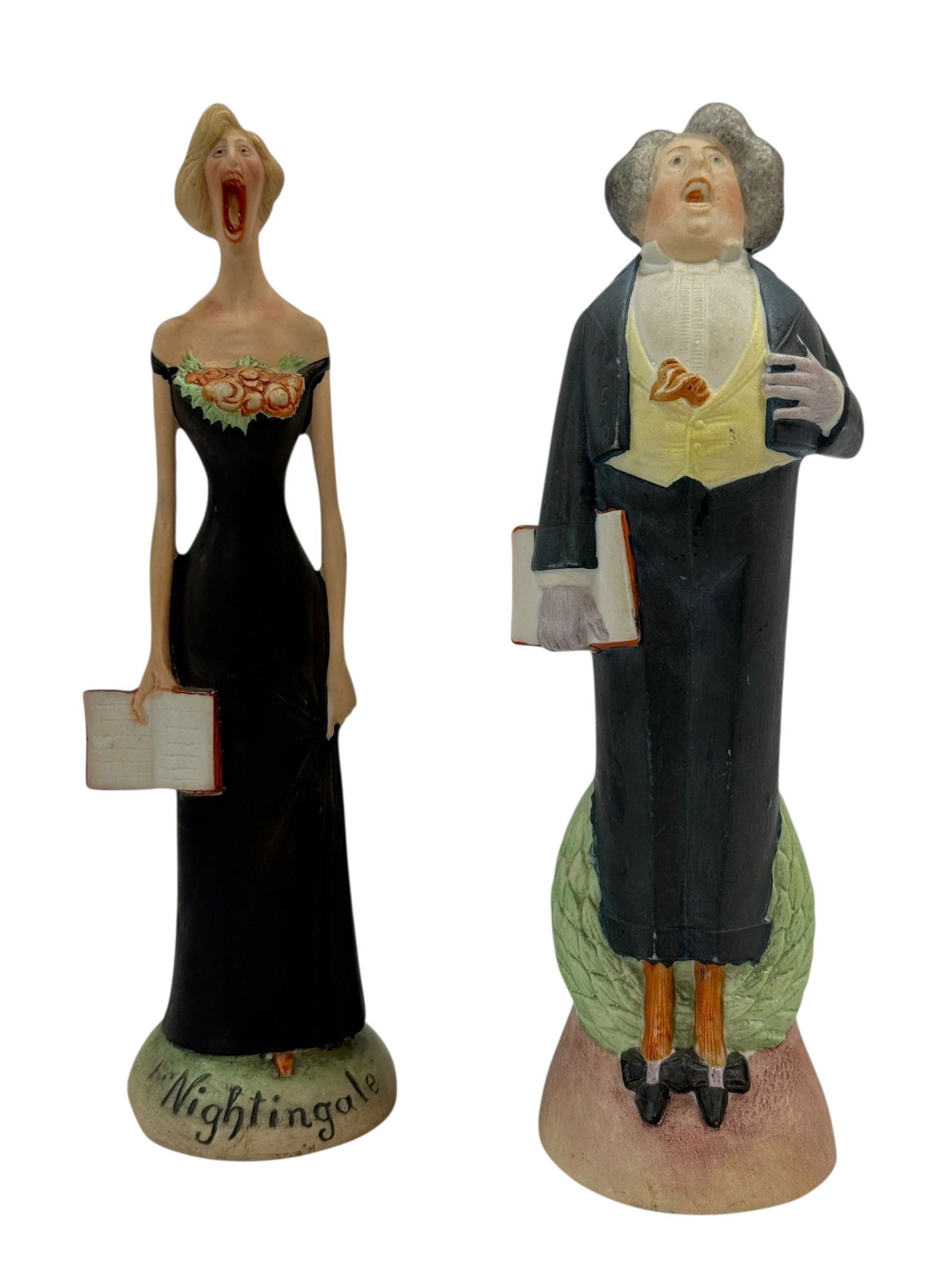 Early 20th Century German Bisque “Schafer/Vater?? Singer Figurines (Pair): A charming and expressive pair of early 20th century German bisque singer figurines, depicting a male and female vocalist mid-performance. Commonly referred to as “Schafer” or “Vater”