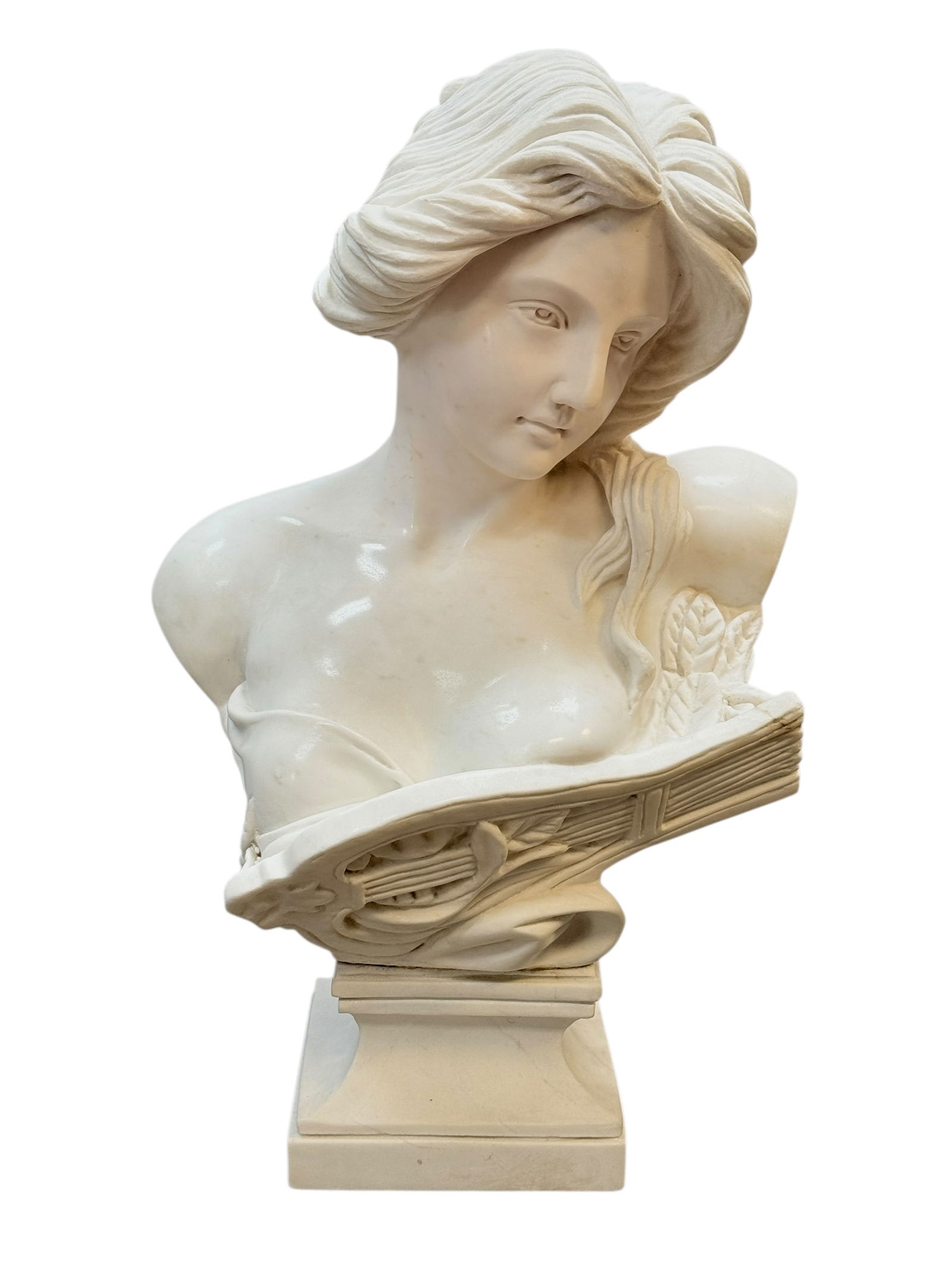 Mid 20th C. Neoclassical Solid Marble Bust of a Woman: A finely carved solid white marble bust depicting a classical female figure in the neoclassical tradition. The sculpture features an elegant downward-tilted gaze, softly modeled facial features, and i