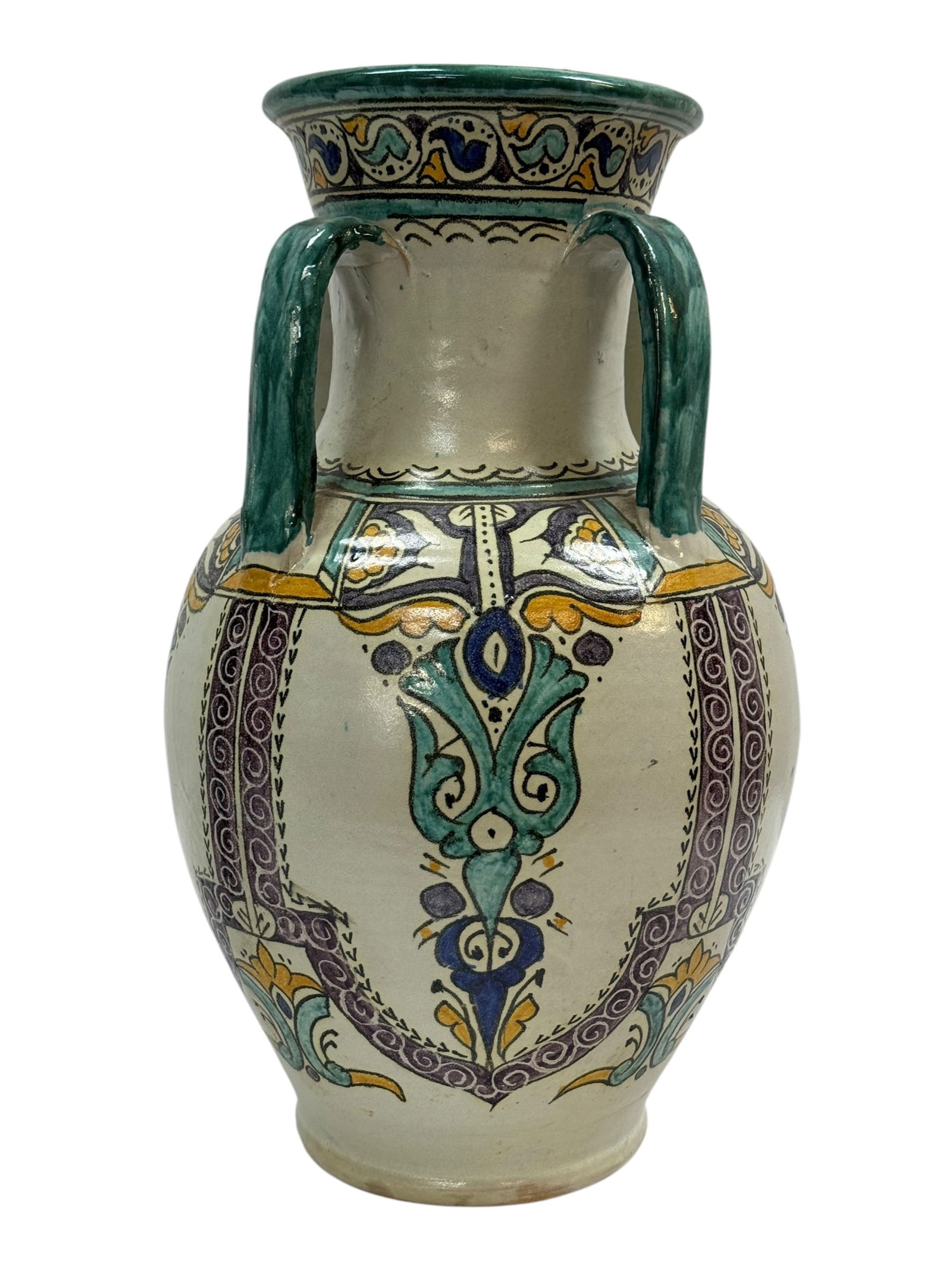 20th Century Moroccan Hand-Painted Ceramic Amphora Vase: A decorative 20th century Moroccan hand-painted ceramic amphora vase, with a broadly rounded body rising to a flared neck enriched by twin applied handles. The surface is boldly decorated in polychrom