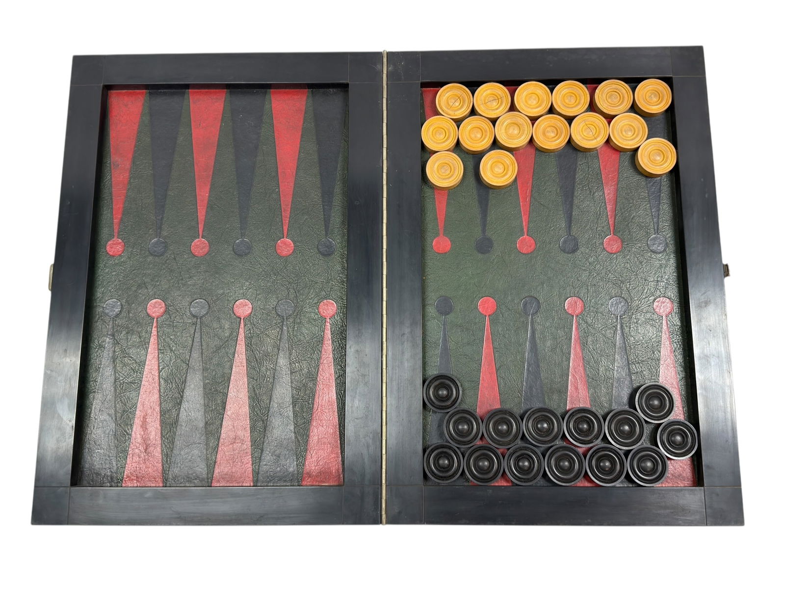 Early 20th C. Clic-Clac Backgammon Supplies Co. Leather Game Board: Early 20th century (circa 1910-1920) leather-covered backgammon game board by Clic-Clac Backgammon Supplies Co., featuring a hinged wooden case with green leather exterior and classic red and black le