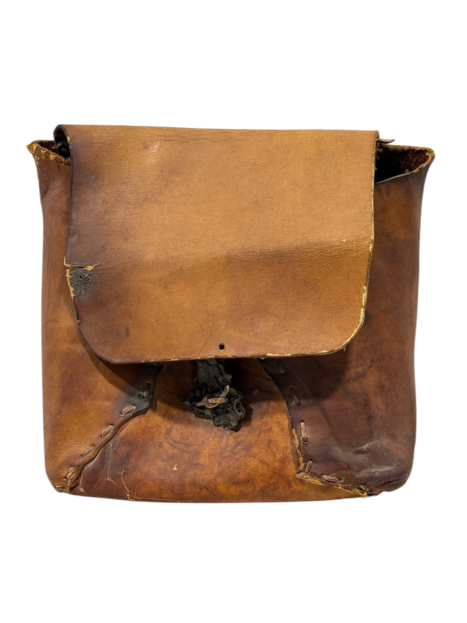 Antique Hand-Crafted Leather Backpack / Rucksack: Early hand-crafted leather backpack featuring thick, vegetable-tanned leather with a rich, naturally aged patina. Constructed using stitched and laced seams, this utilitarian bag reflects early workma