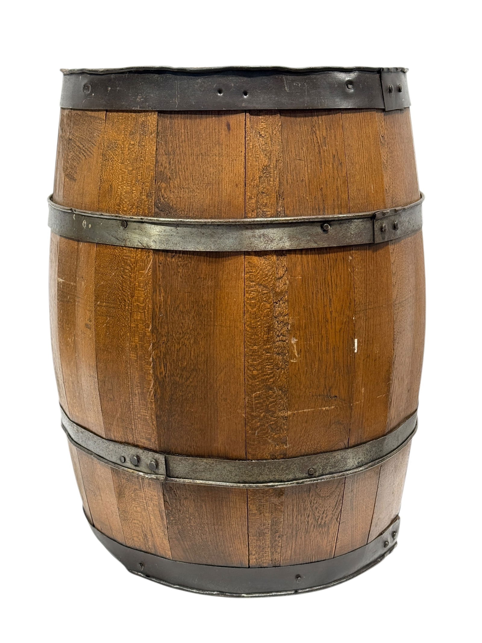 Antique Oak Barrel with Iron Bands: This antique oak barrel, dating to the late 19th or early 20th century, is constructed from solid oak staves bound by original hand-forged iron hoops and exhibits a rich, time-earned patina throughout